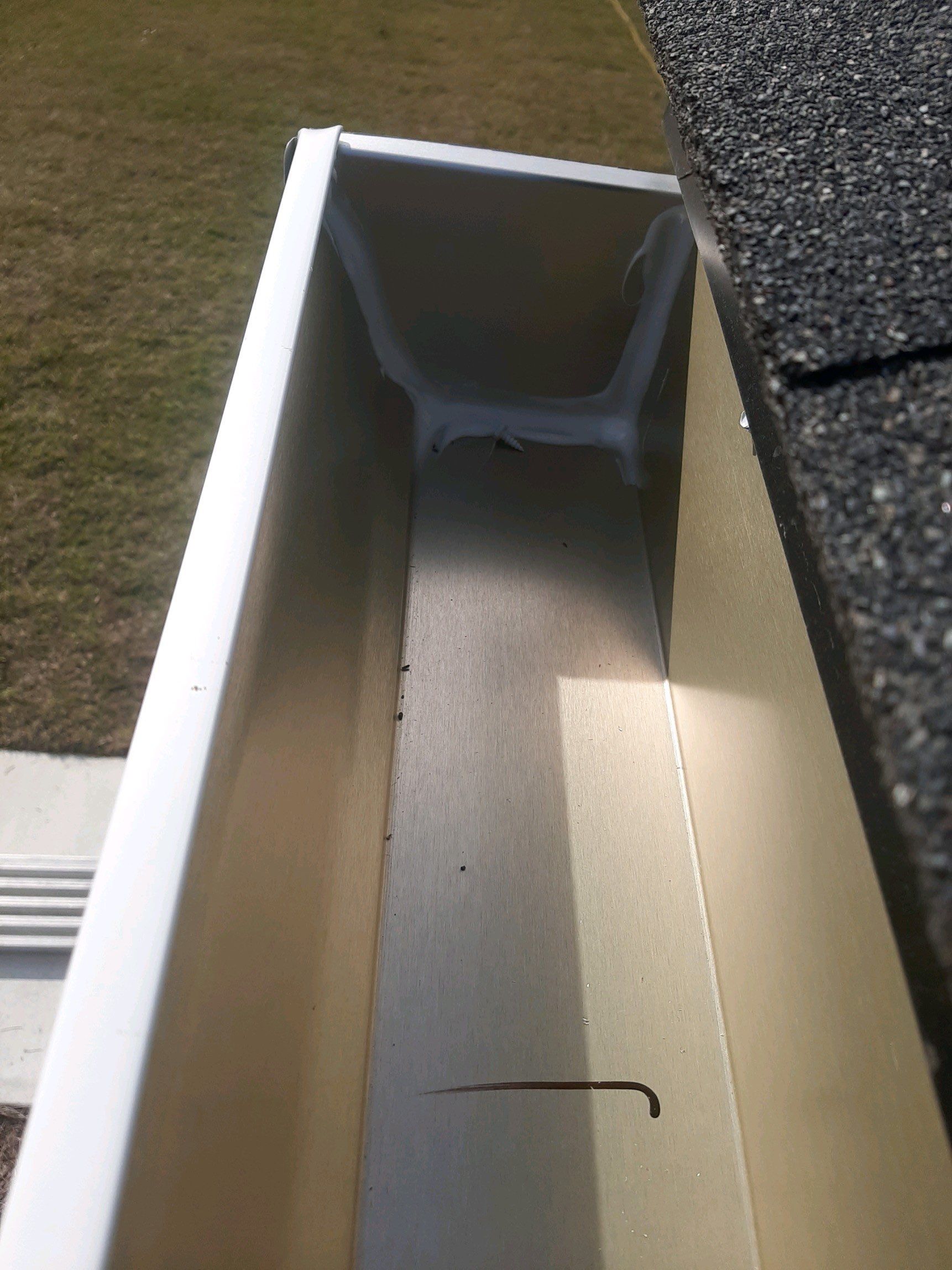 Seamless Gutter Installation Using White K-Style Gutters by Gutter Professors