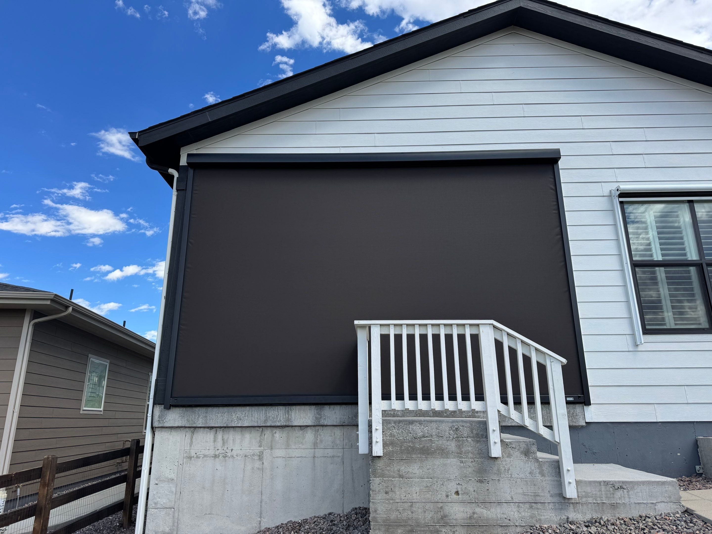 Motorized Exterior MagnaTrack Screen Installation for Castle Rock Patio by Outdoor Solutions Colorado