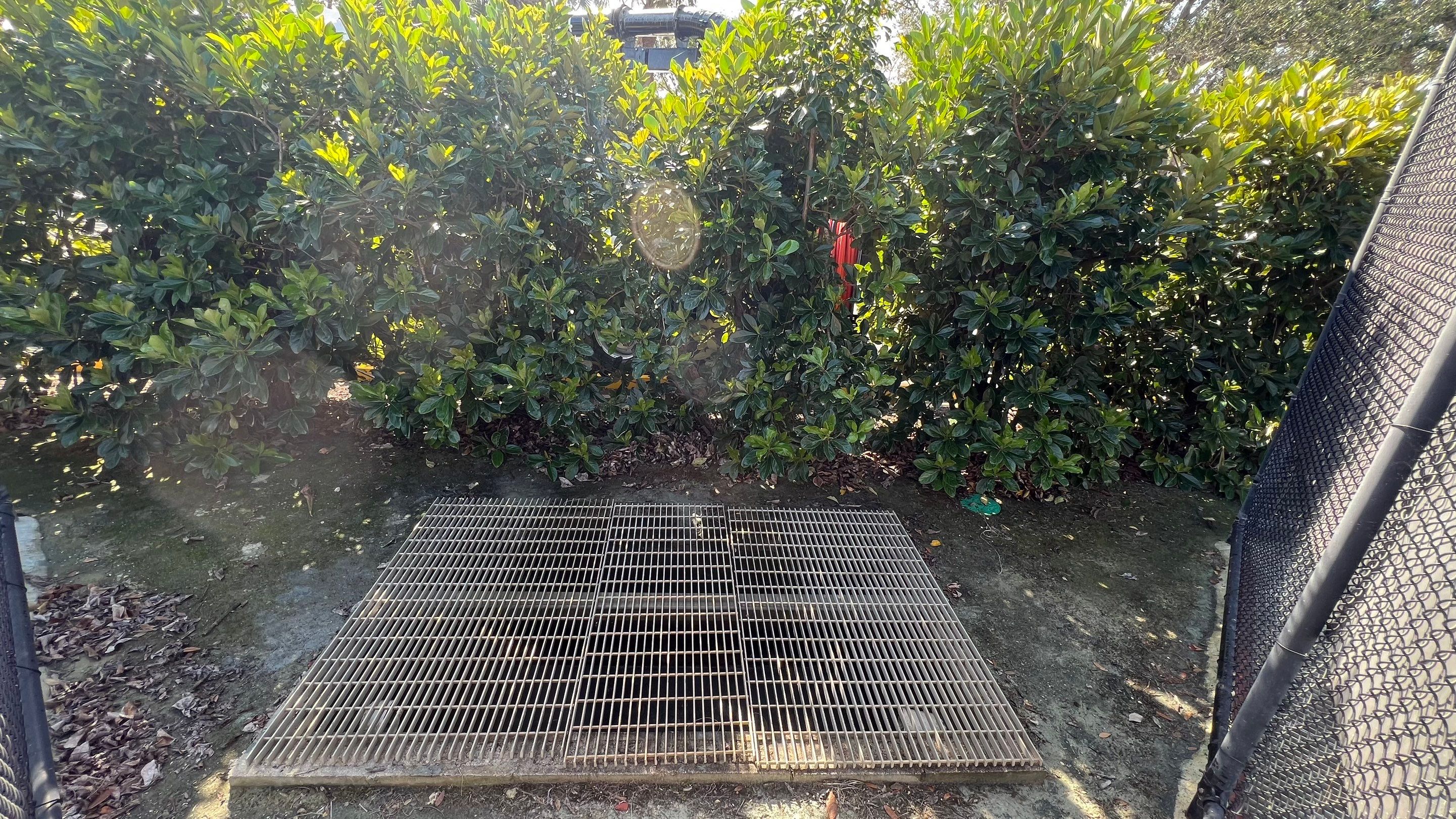 Pelican Landing Tennis Court Catch Basin Cleaning by APS Power & Water