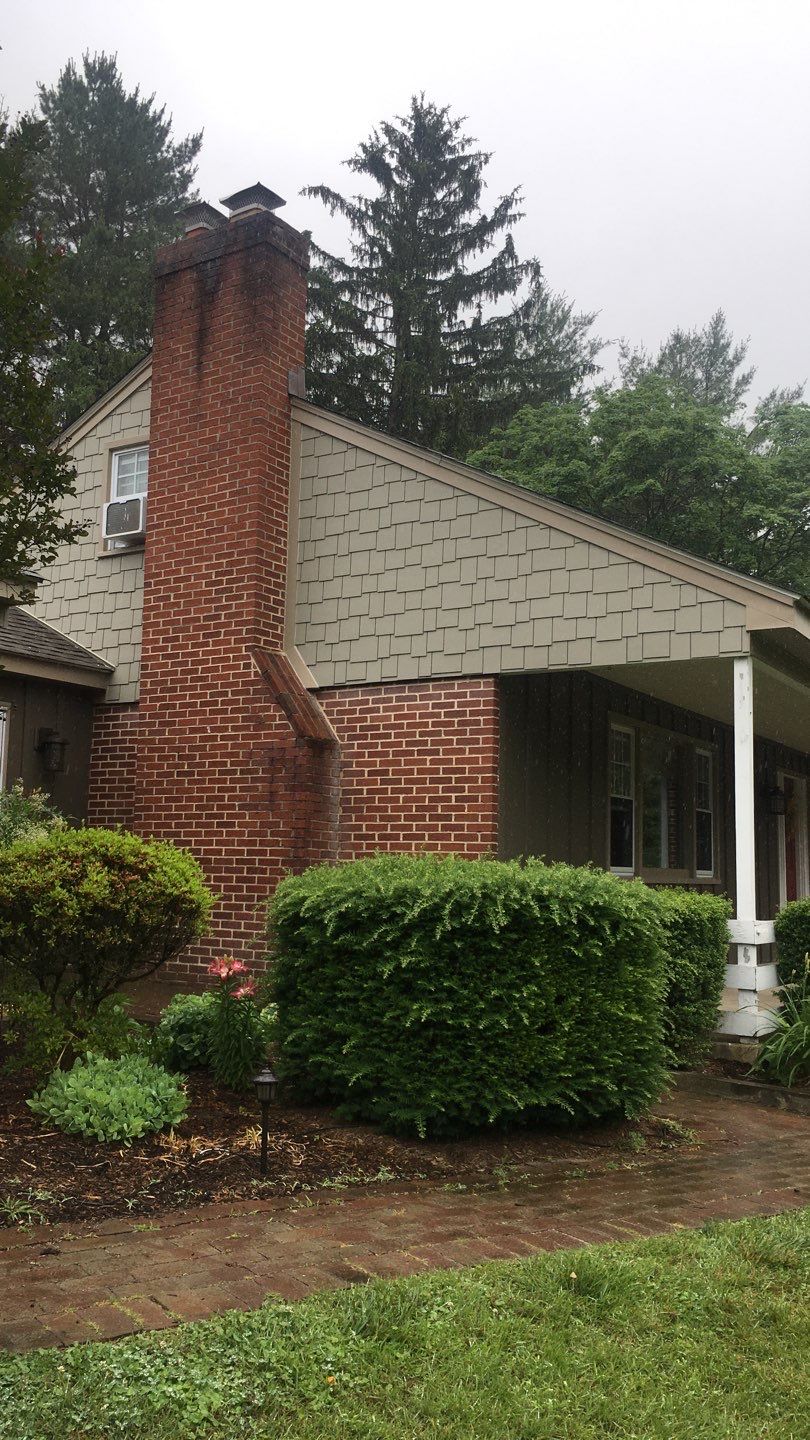 Gutter and Siding Replacement by American Home Contractors