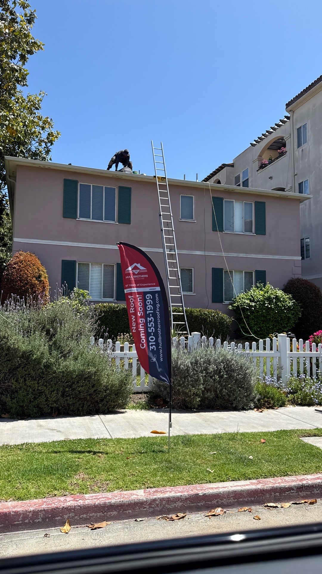 Apartment Building 2nd Layer Installation &Silicone coating by Hull Brothers Roofing