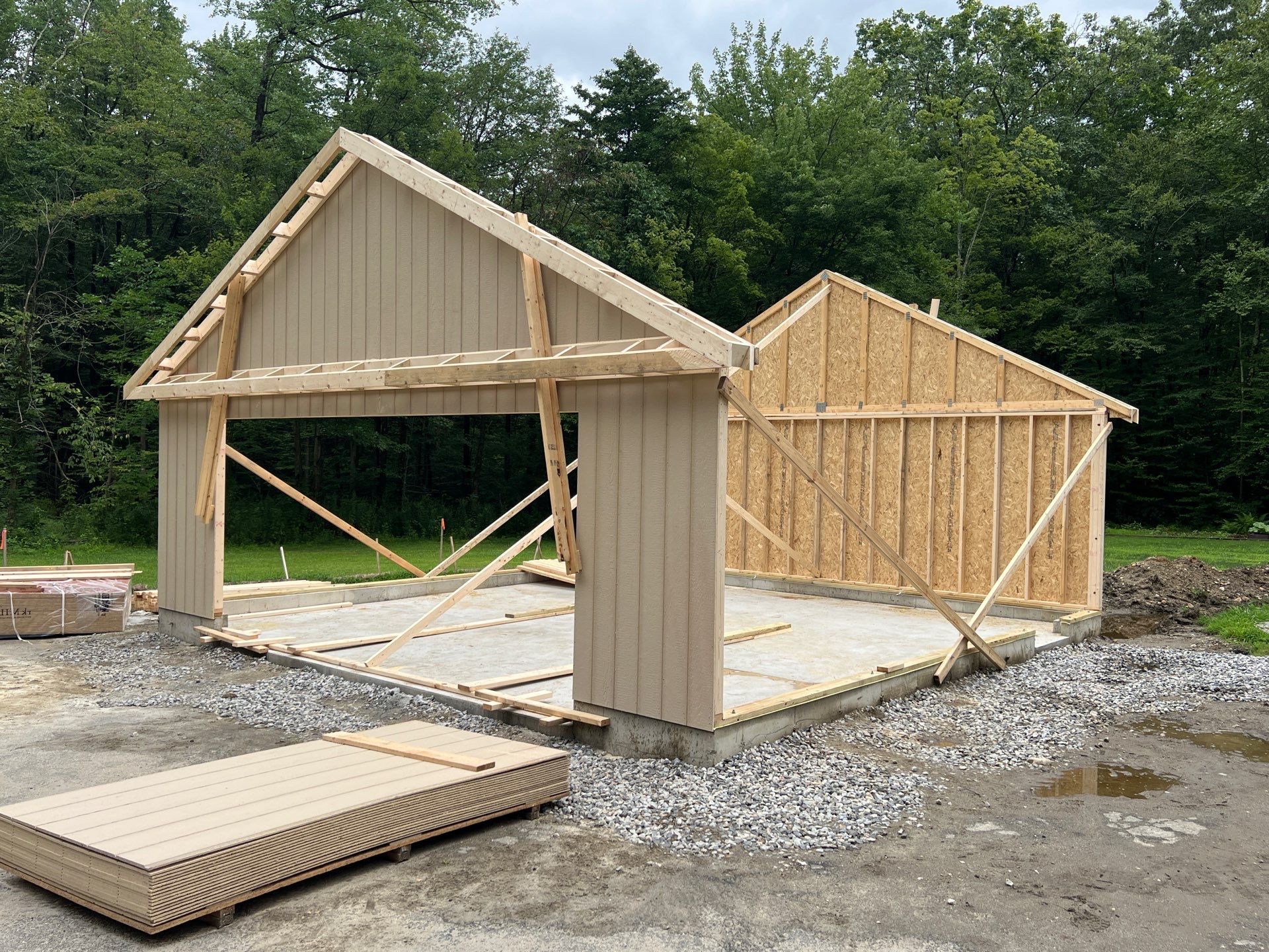 Two-Car Garage using LP SmartSide Panel Siding by Chagnon Building & Remodeling LLC