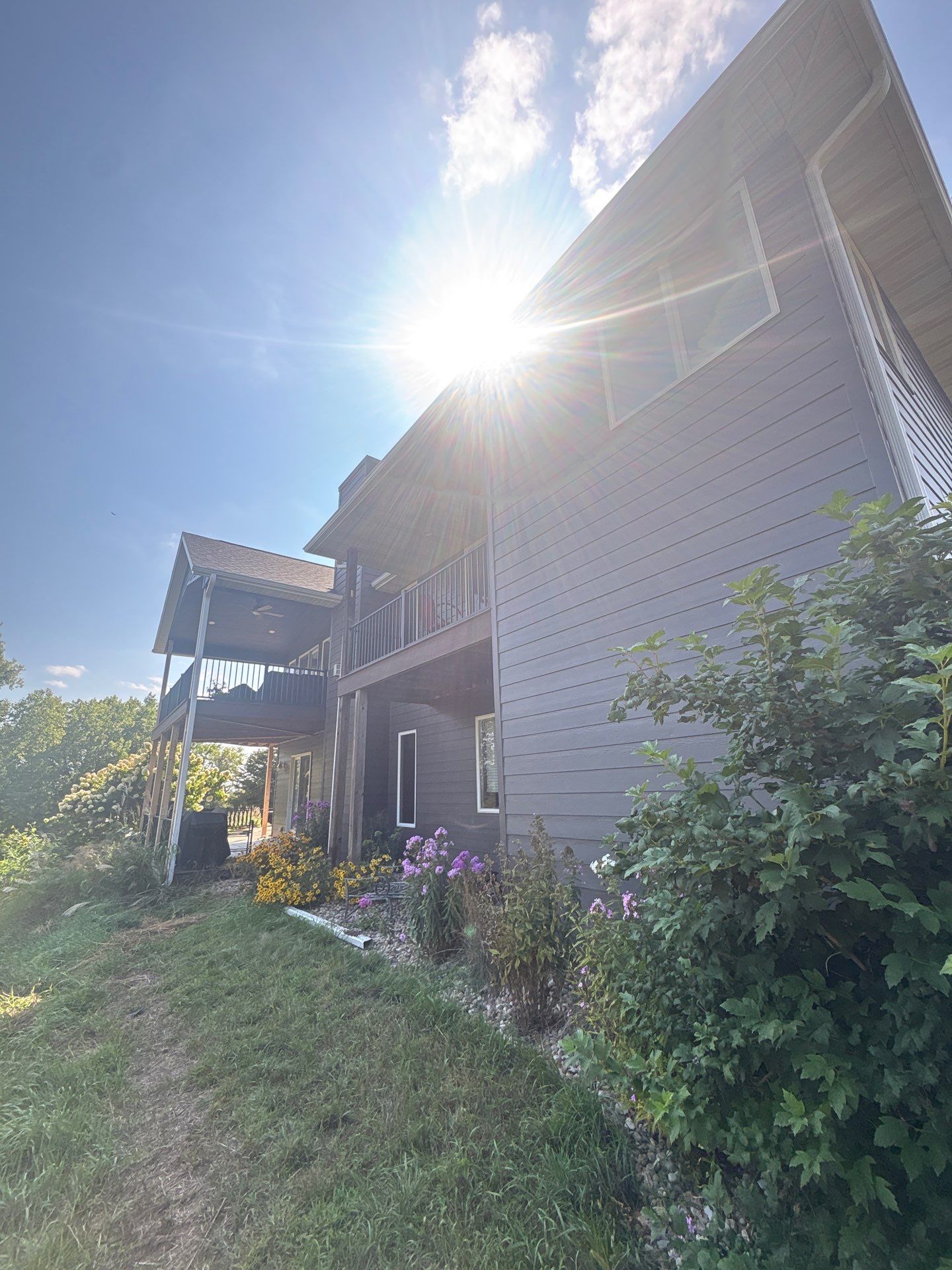 Sioux Falls Residential Exterior Painting and Siding Refresh by Select Painting, Coatings & Garage Cabinets
