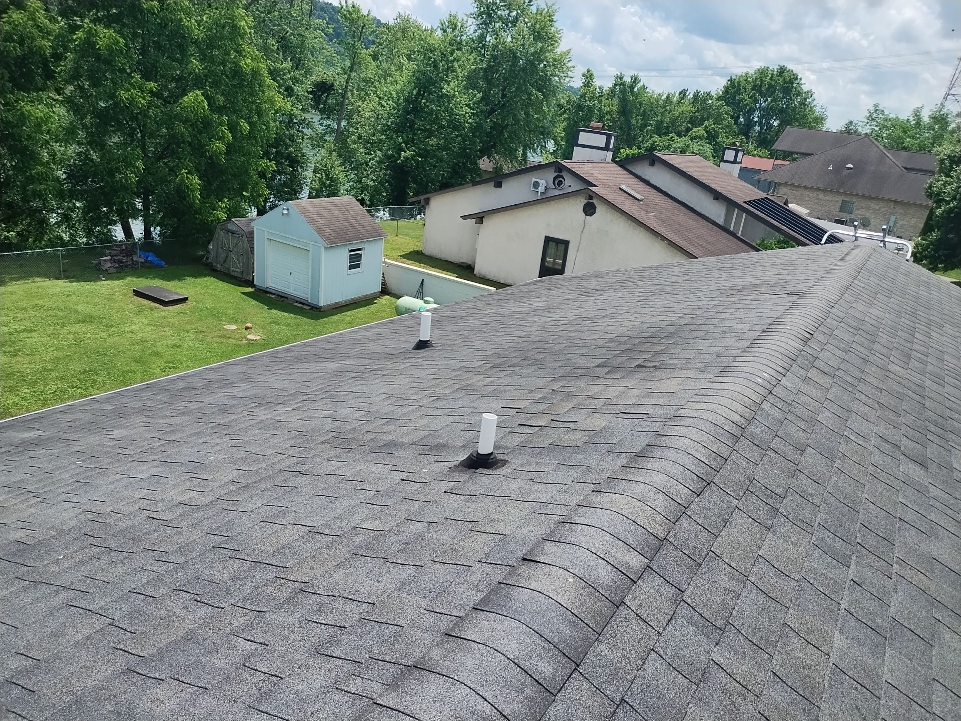 Residential Roofing Installation using Performance Shingles by Mr. Roofer
