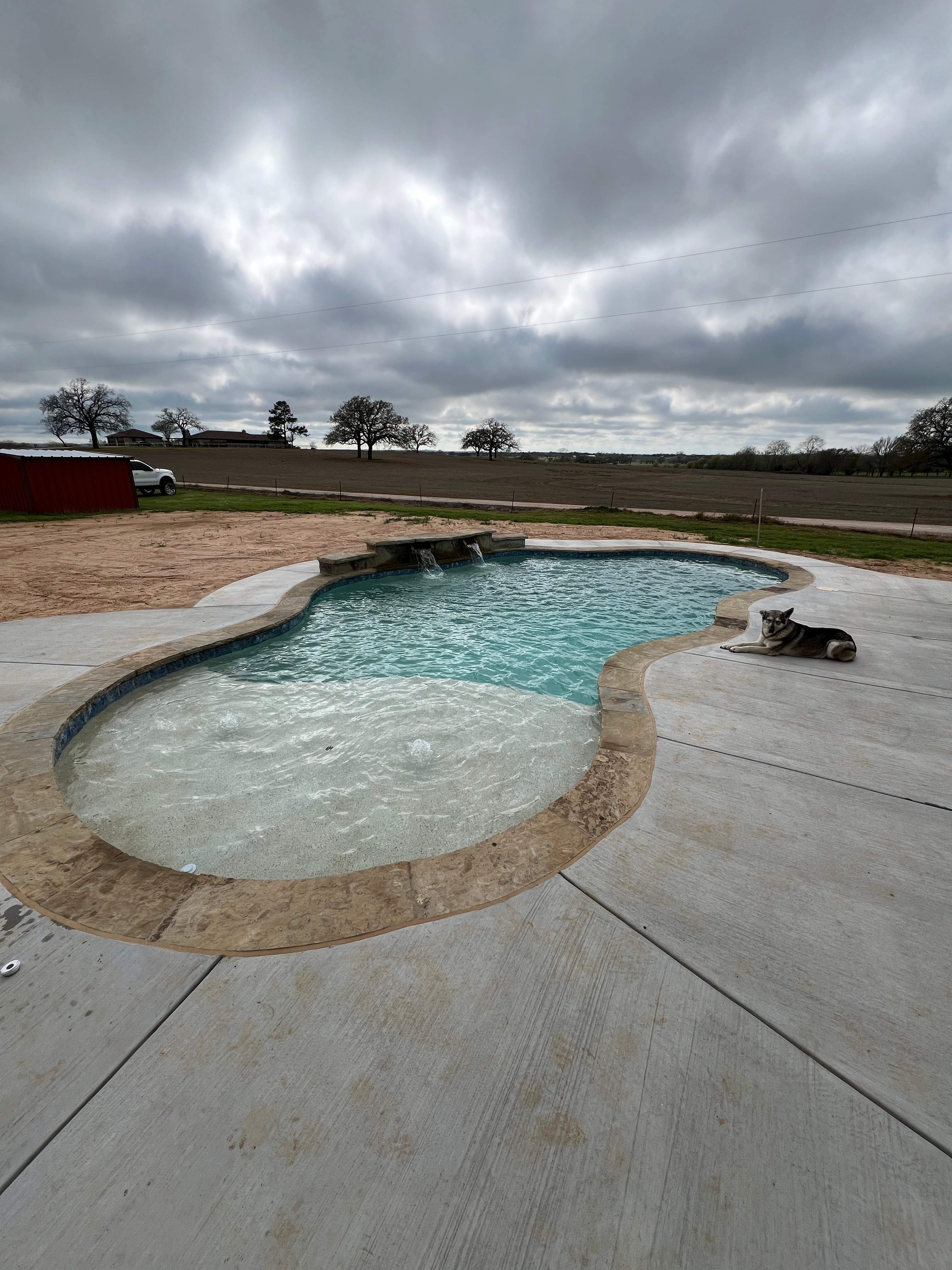 Freeform Pool with Raised Spa and Spillway by Pinnacle Pools and Spas - DFW