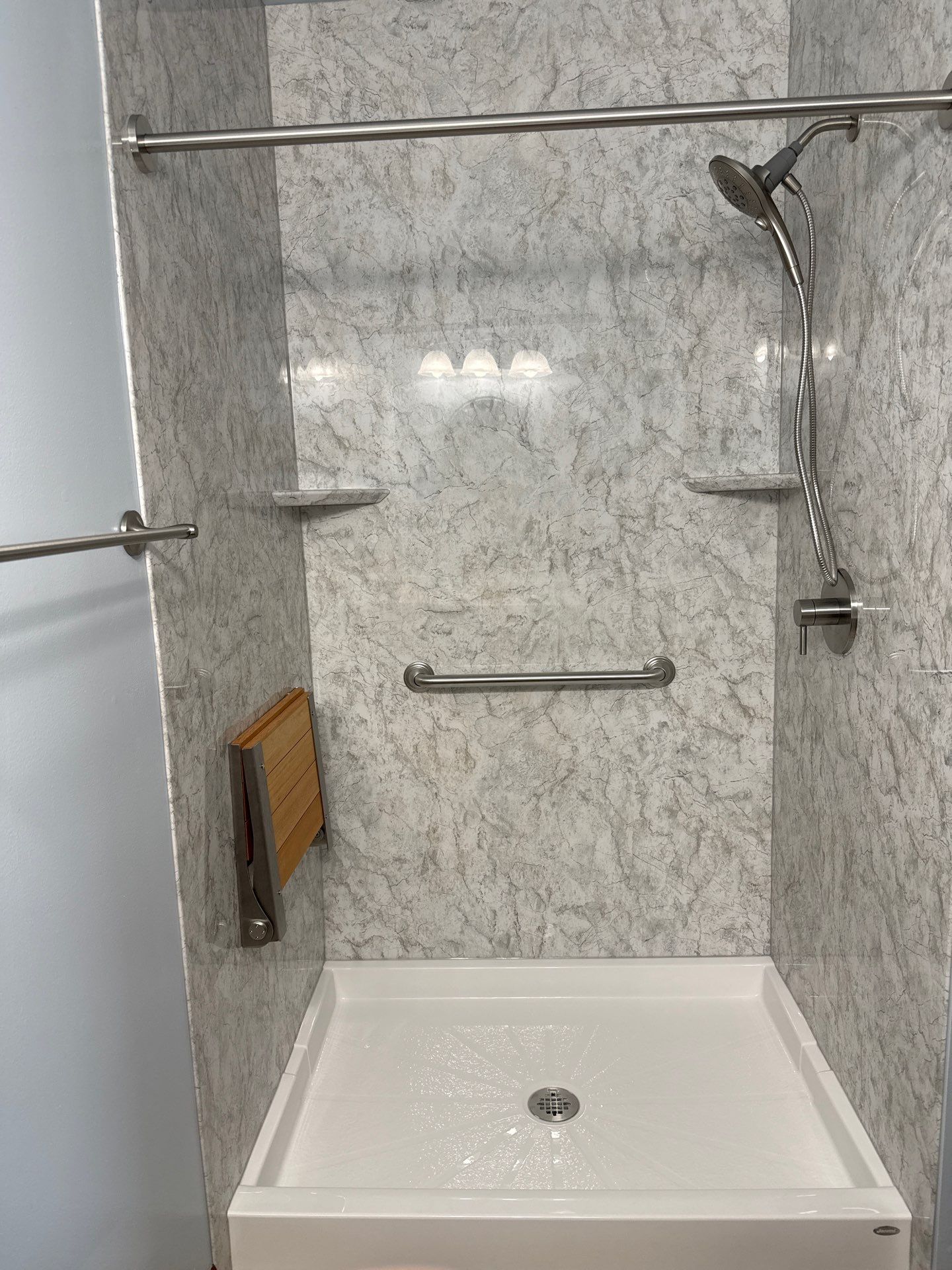 Jacuzzi Walk-In Shower Conversion Featuring Marble Acrylic Walls in Gaylord by Rainbow Seamless Systems