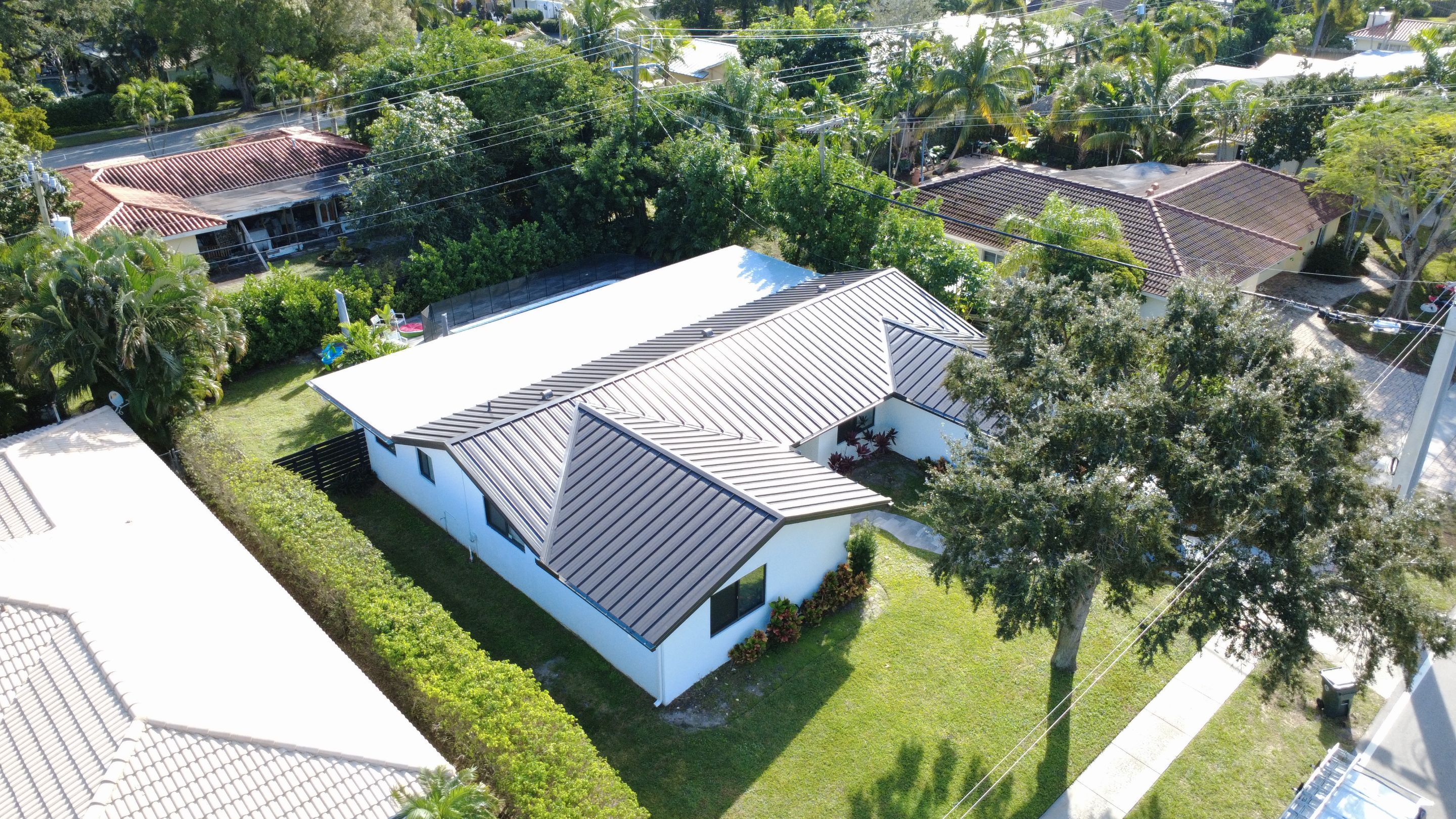 Residential Roofing Installation using 1" Nail strip metal roof by BLUES BROTHERS ROOFING