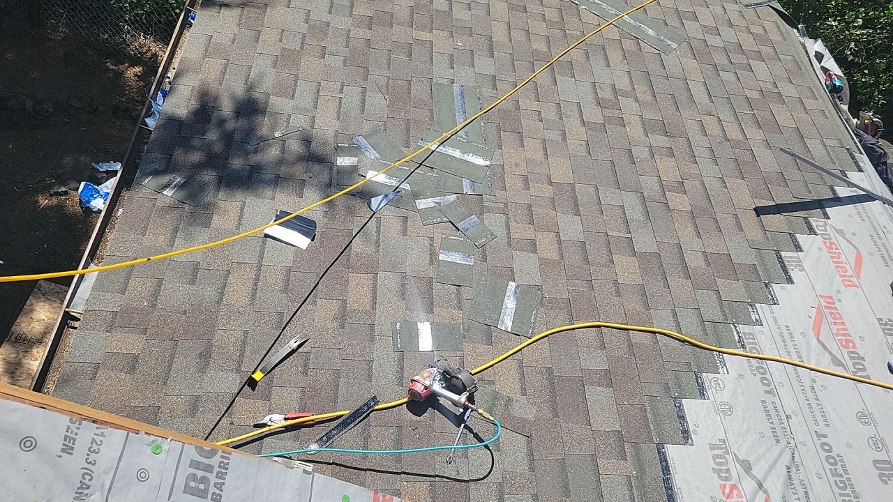 Residential Roofing Installation using Malarkey Highlander with GAF 60mil TPO by Orezona Building & Roofing Company, Inc.