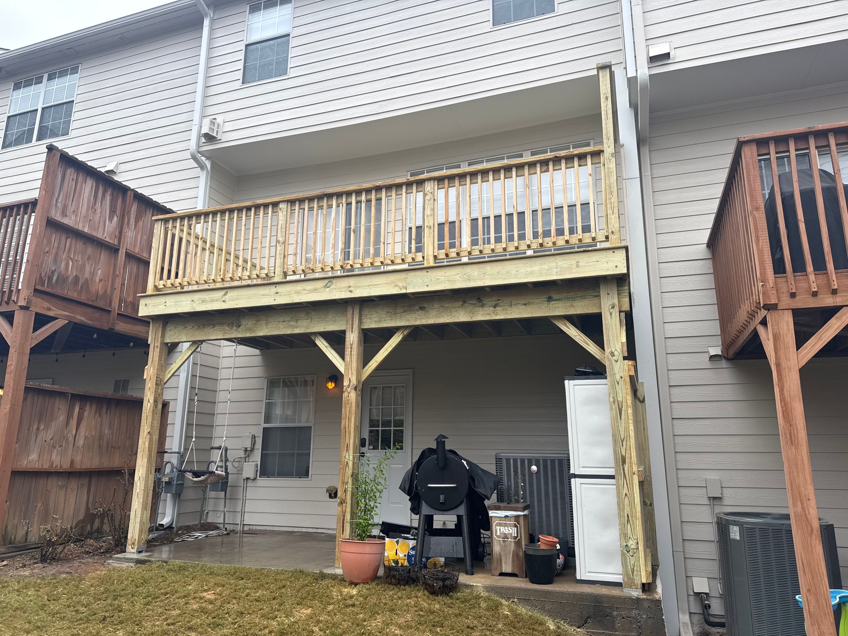 New Second-Story Pressure-Treated Wood Deck Installation in Atlanta by Swift Home Renovations