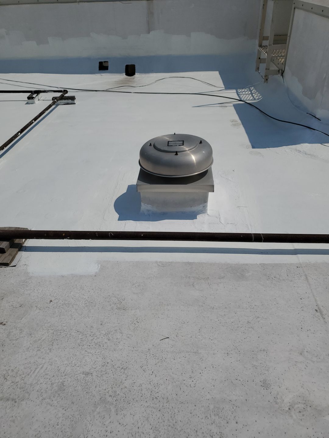 Commercial Roofing Repair using Silicon Roof Coating by JM Flores Roofing & Construction, Inc