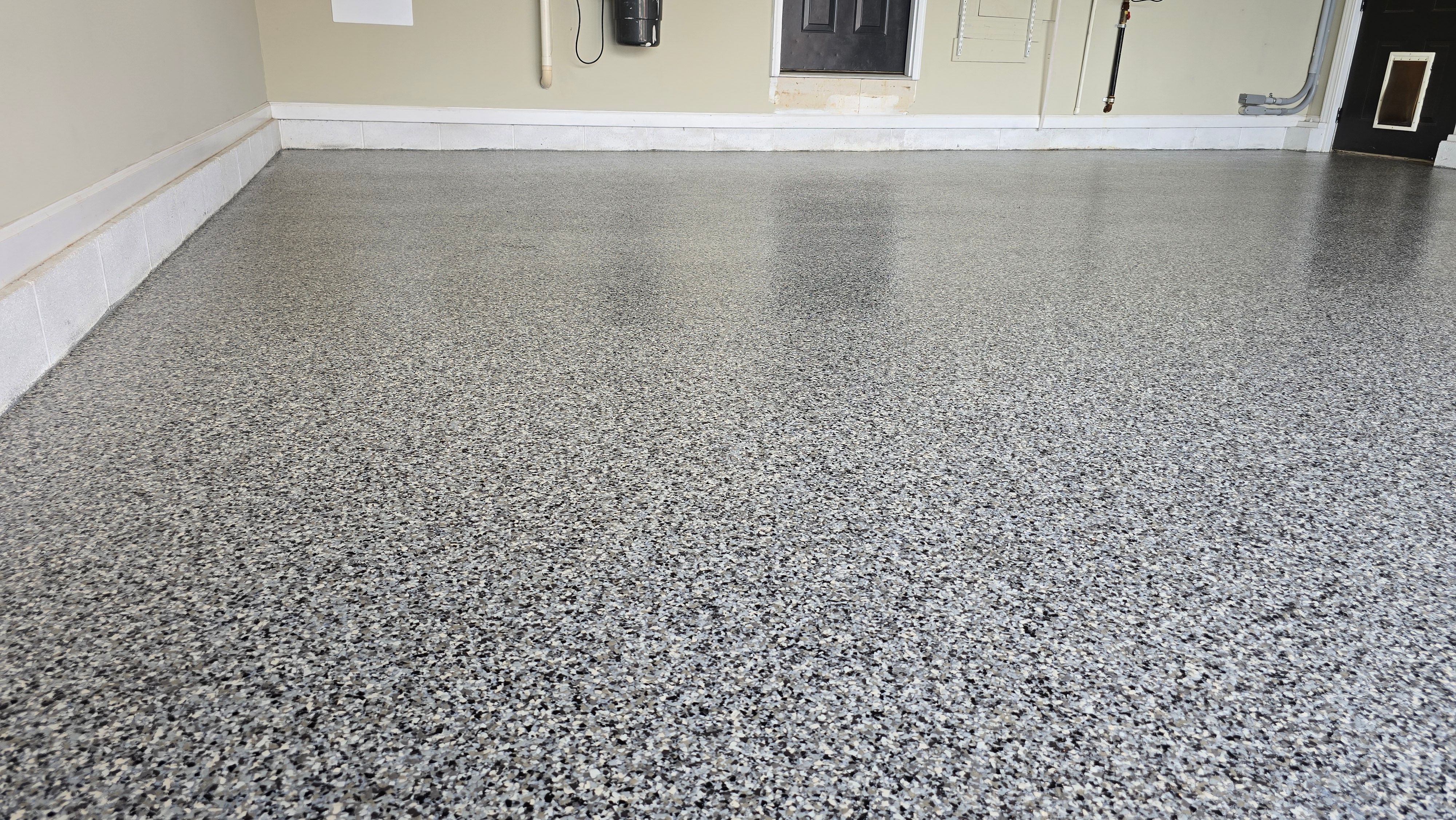 Two garages completed using Hog and Morel  by Elite Floor Solutions