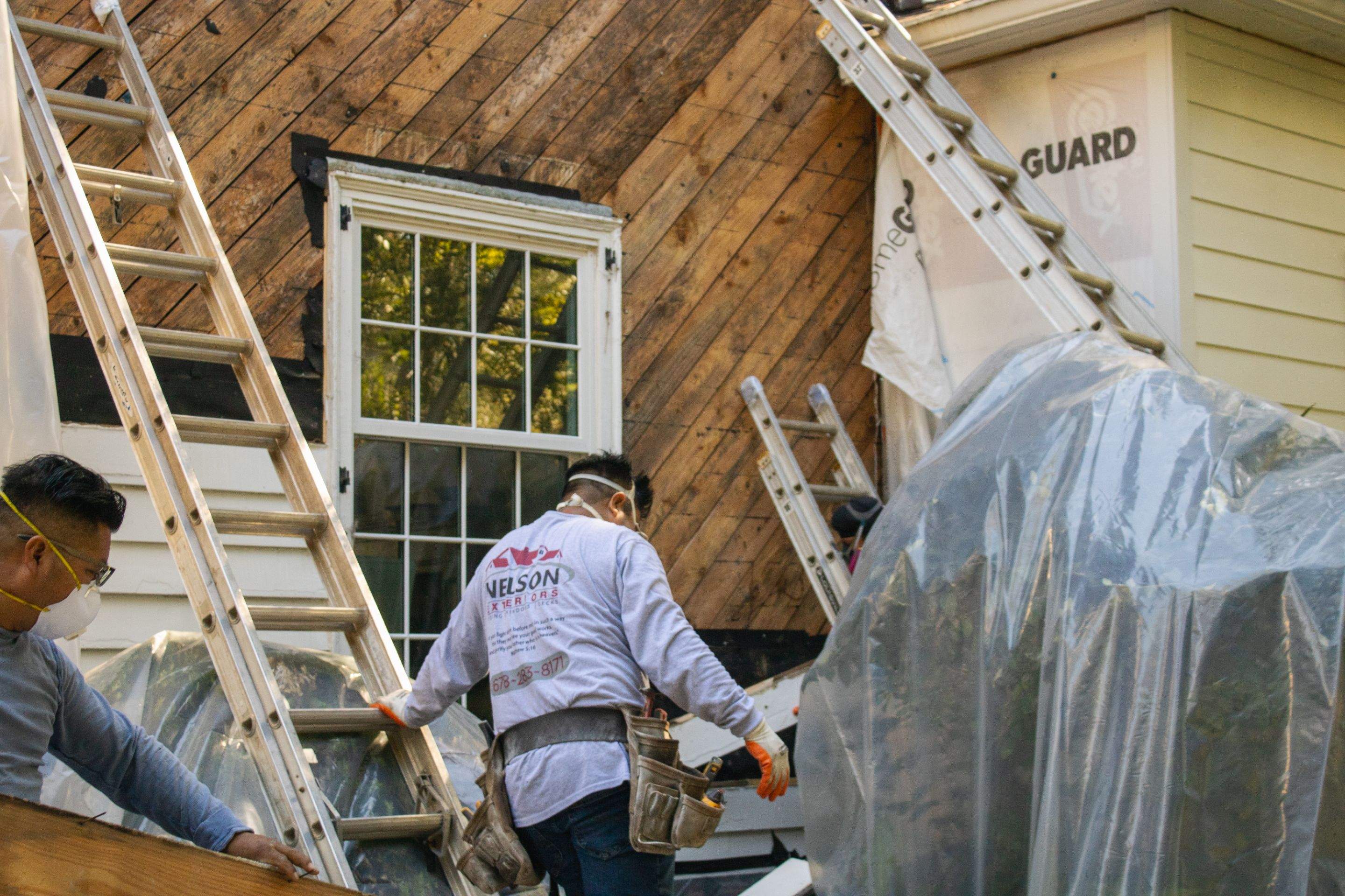 Siding Installation using James Hardie Color Plus Lap Siding by Nelson Exteriors 