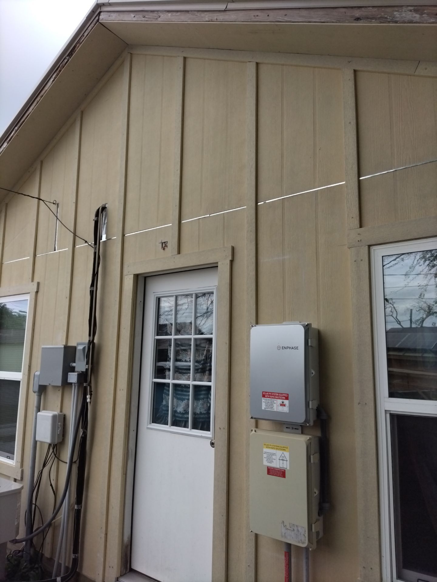 Vinyl to Hardie by Bayfront Roofing and Construction