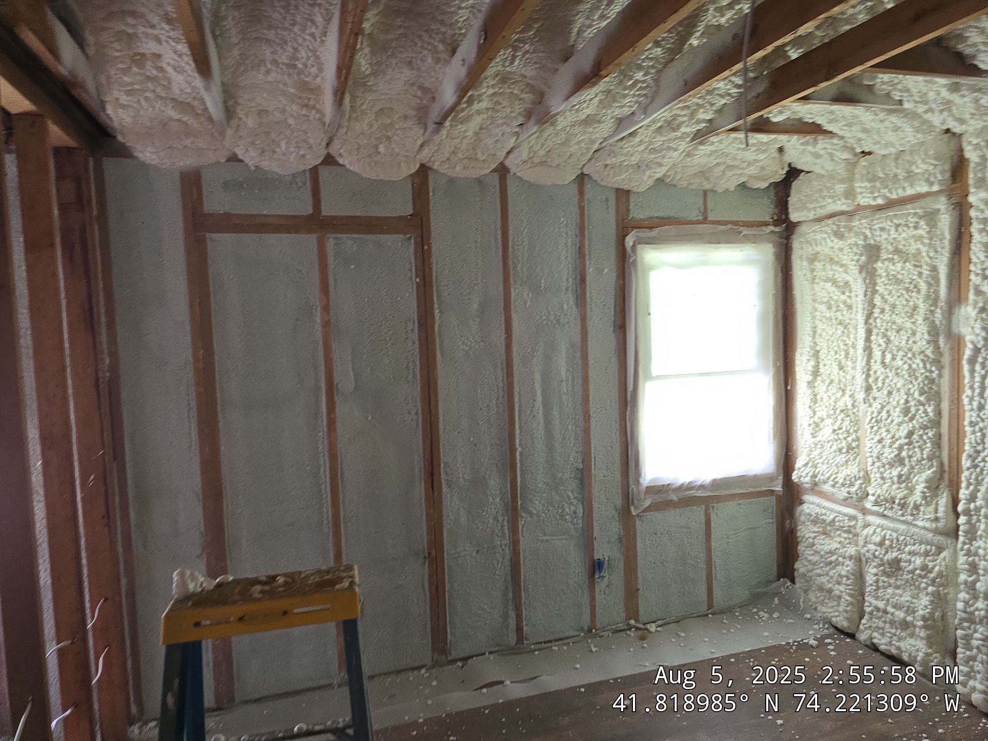 Master bedroom Exterior Walls using open cell spray foam by NYS Foam & Energy