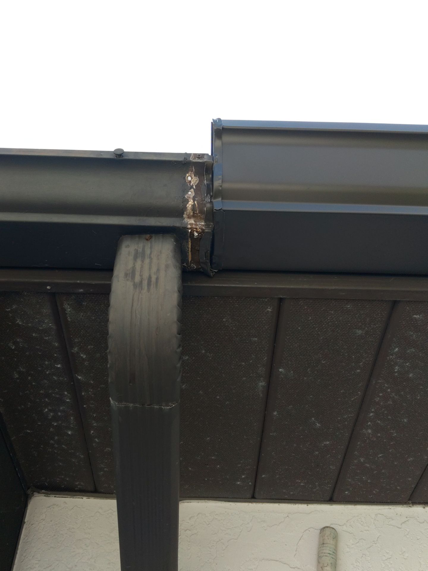 6 Inch Seamless Gutters using Musket Brown Seamless Gutters in Cape Coral FL by Gutter Professors