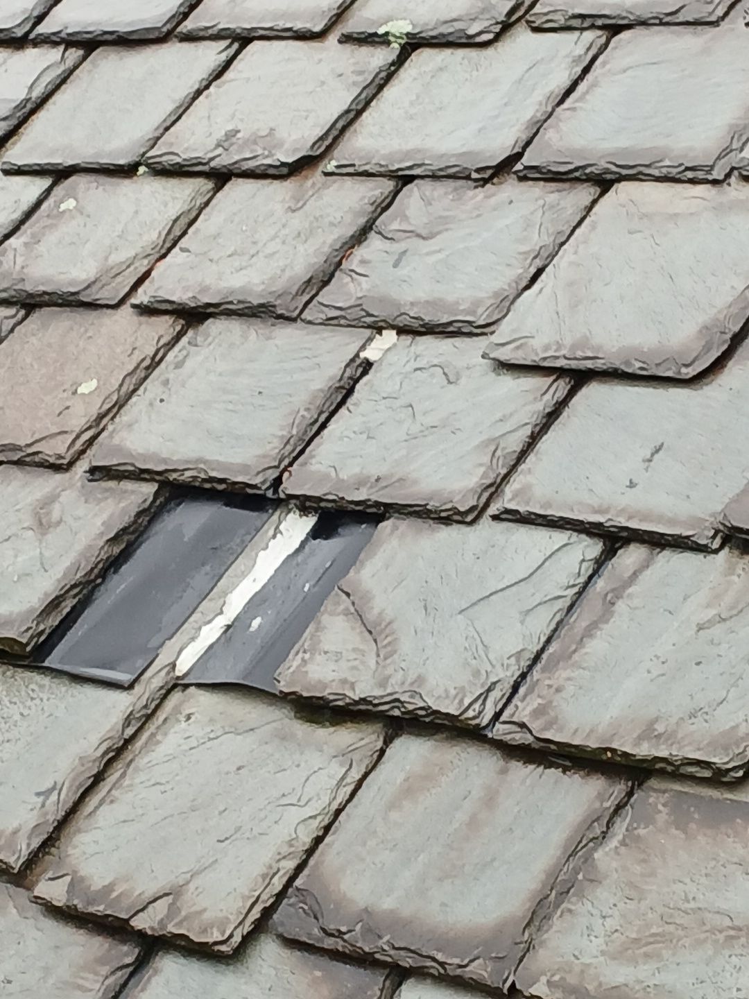 Slate Roof Repair using Slate Tiles by Absolute Roofing and Construction