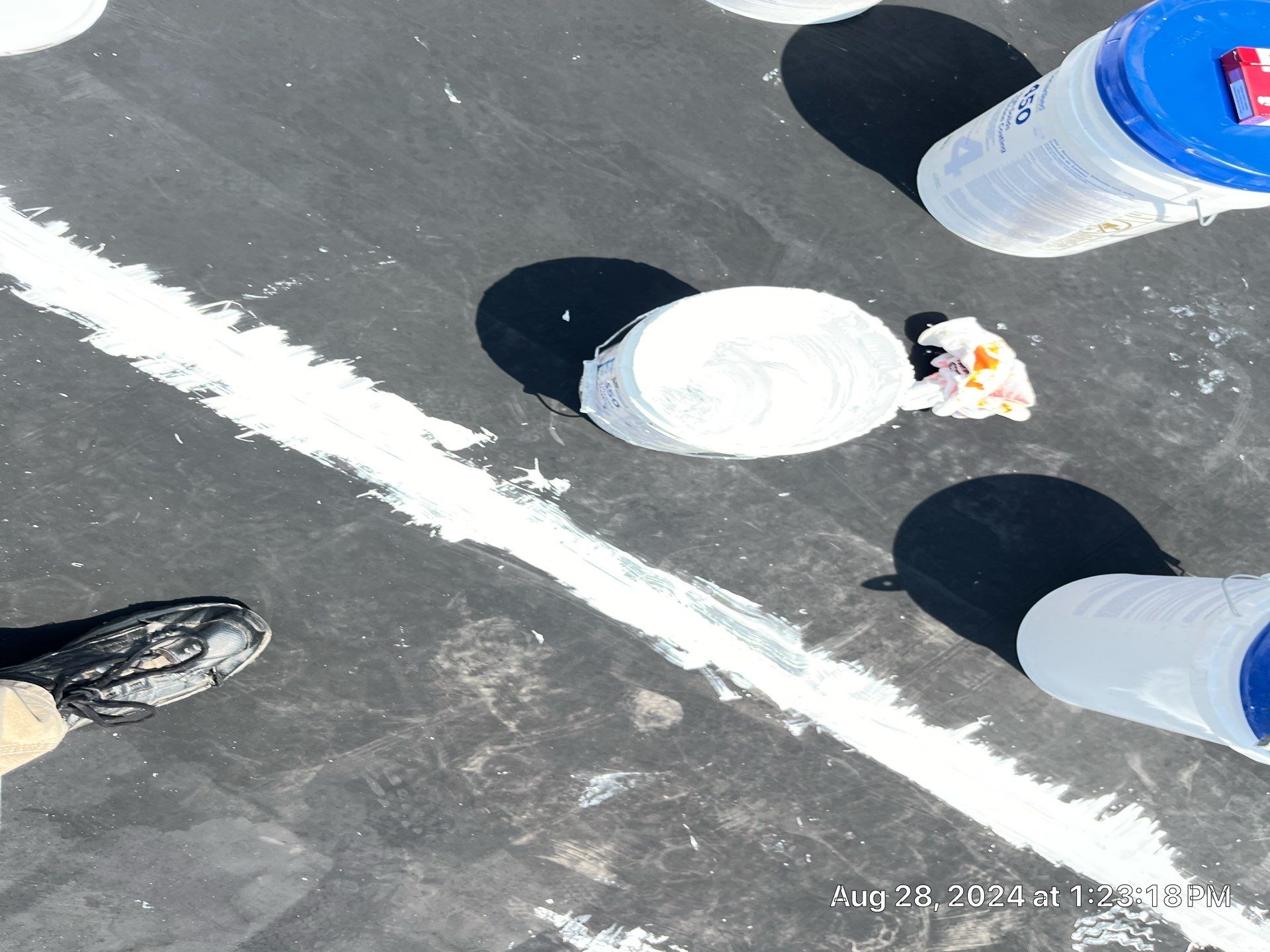 Commercial Roofing Installation using smartcoat Roof coating by Fahey Roofing + Contracting