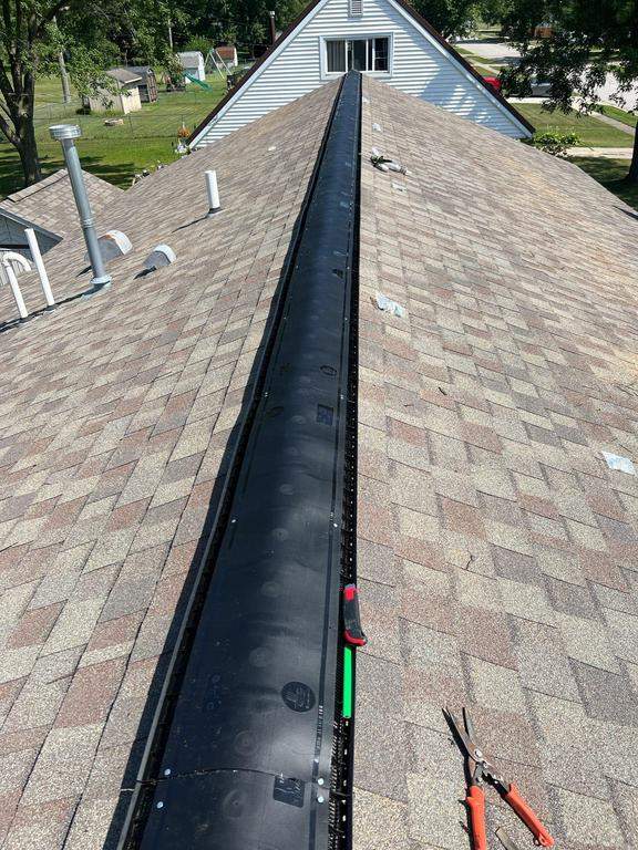 Residential Roofing Repair using Ridge vent replacement by Nitro Roofing and Construction