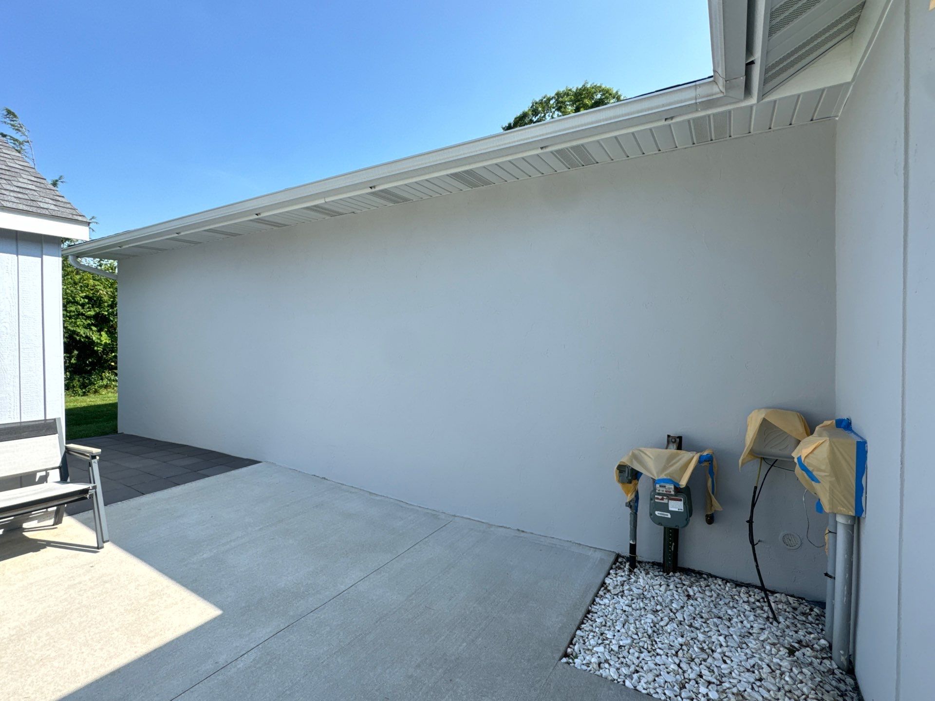 Norton Shores Residential Stucco Repair and Exterior Painting Refresh by Gordon Painting