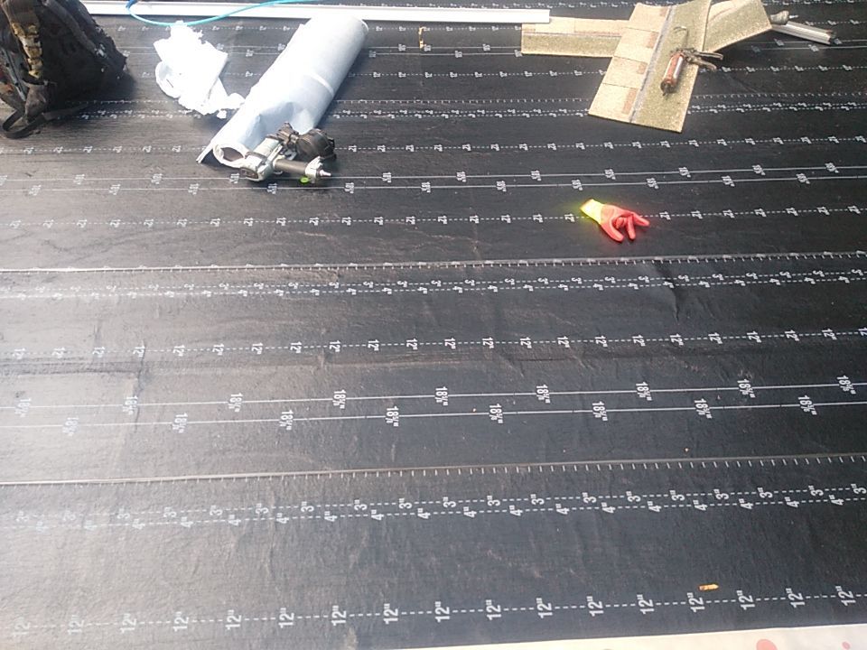 Residential Roofing Installation using Roof Replacement by American Roofing & Construction LLC