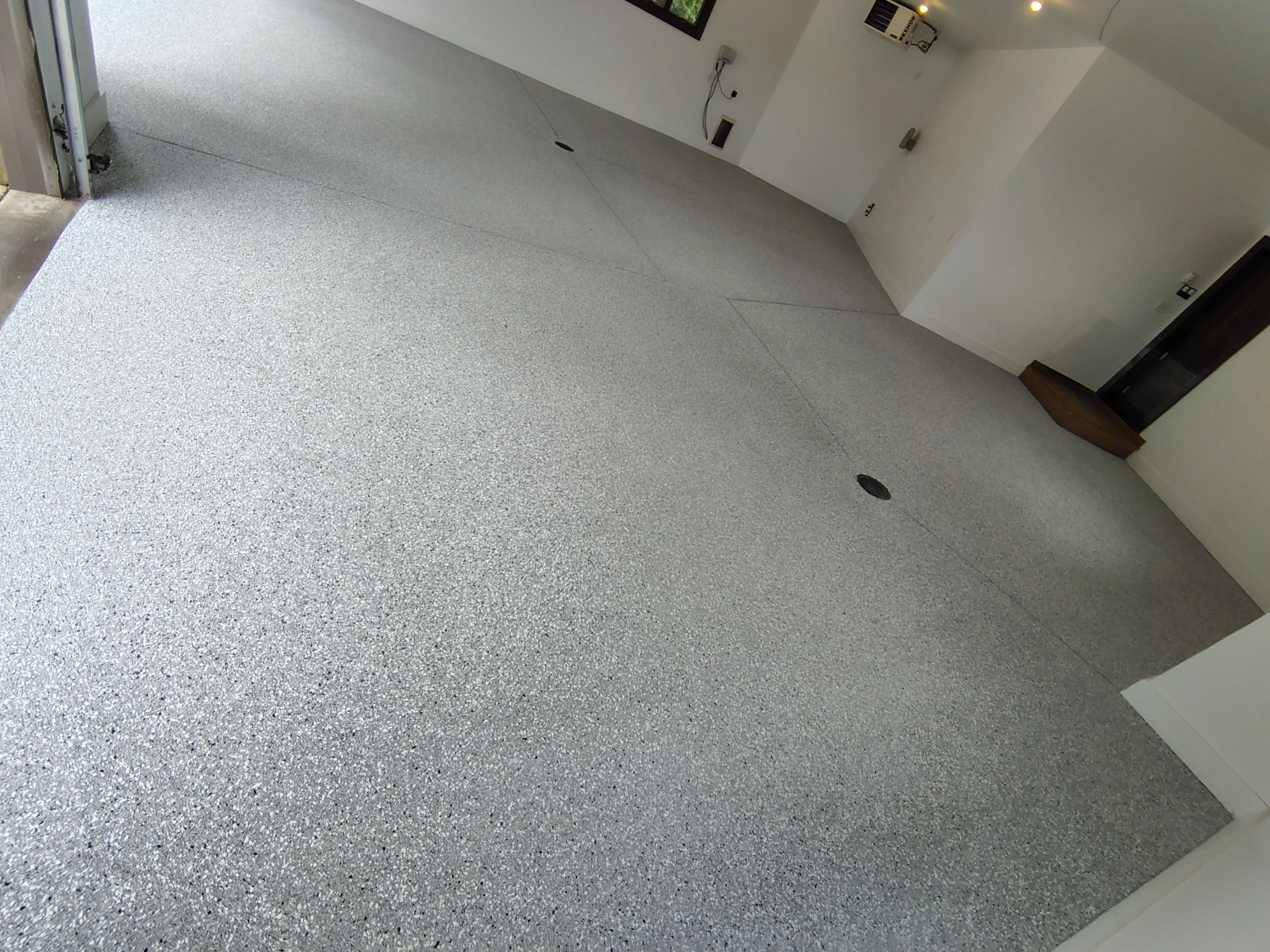 Feather Grey Floor Coating in Sioux Falls, SD by Select Painting, Coatings & Garage Cabinets