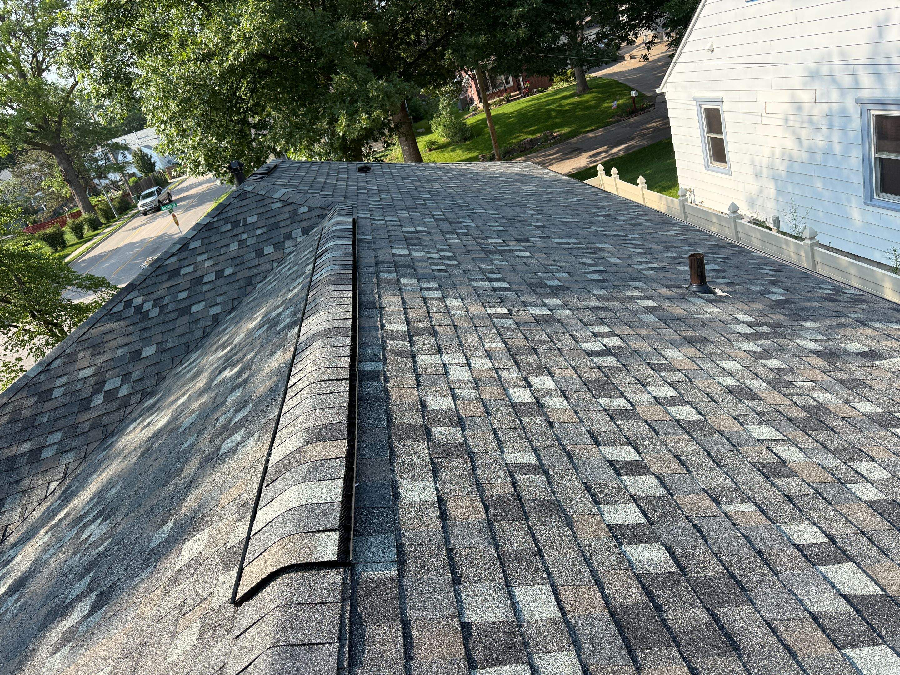 Asphalt Architectural Shingle Installation and Roof Deck Repairs in Lincoln by Star Home