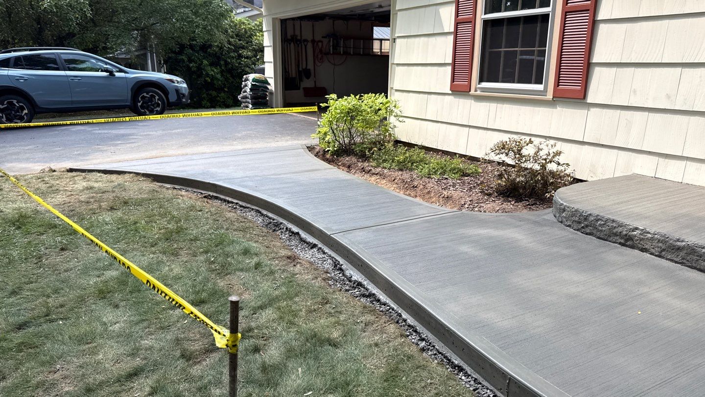 Broom Finish Walkway  by NG Masonry & Construction LLC