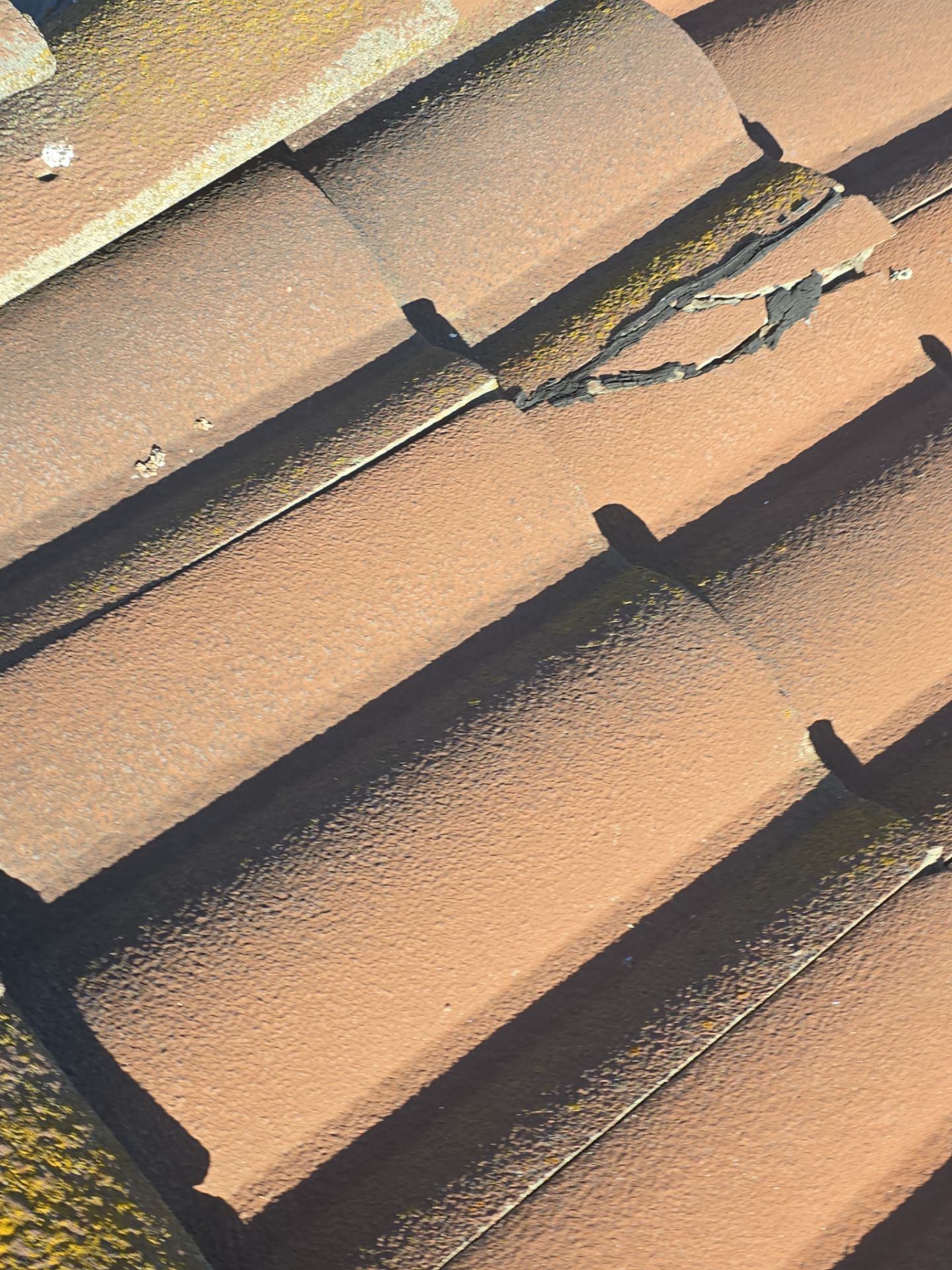 Tile Roof repair by Grandmark Service Company