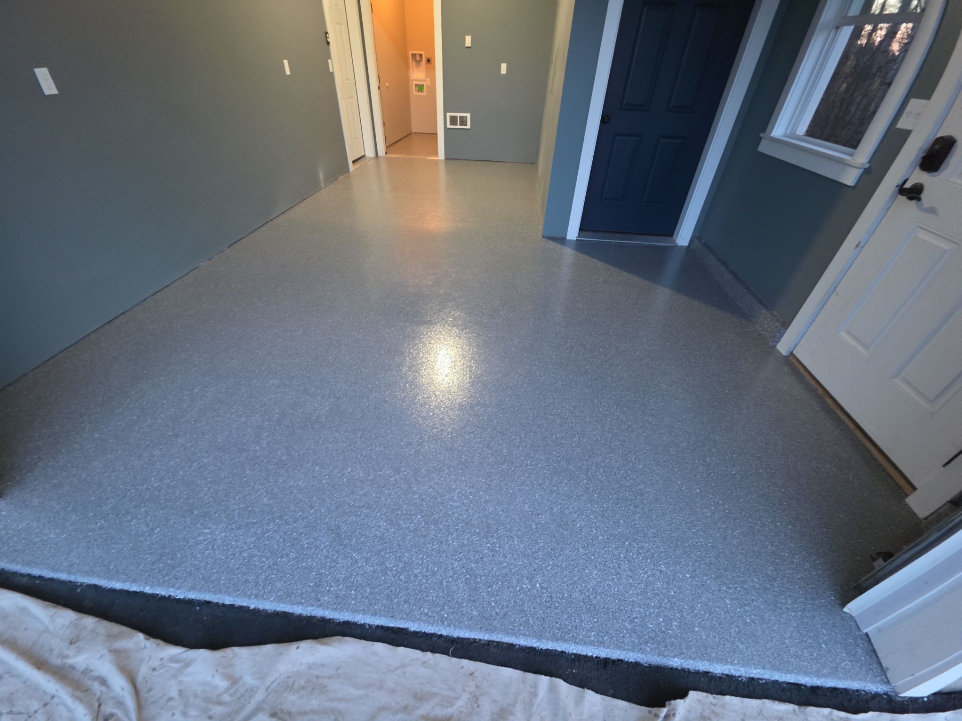 Garage Transformation using Turquoise Hybrid by Croc Coatings, LLC