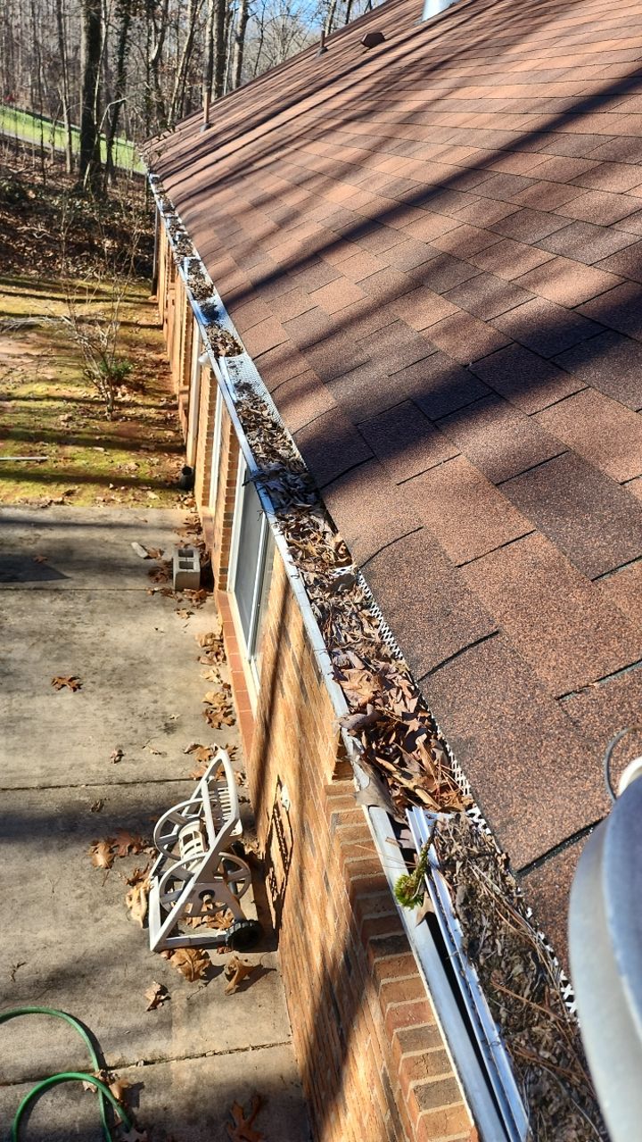 Gutter and Roof cleaning using cleaner by G&H Home Tech Pros LLC