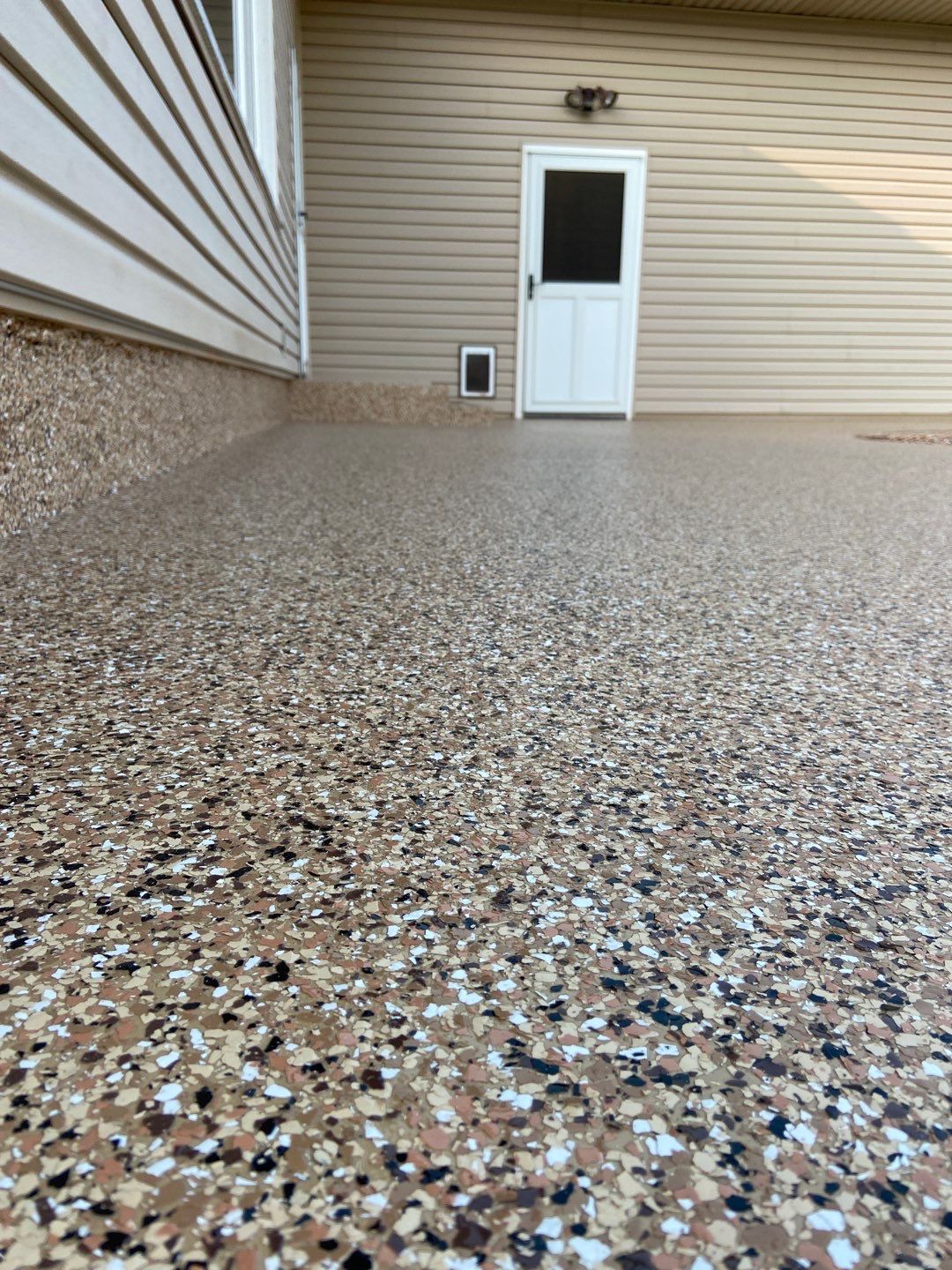 Porch Installation with Sandstone by Copperhead Coatings