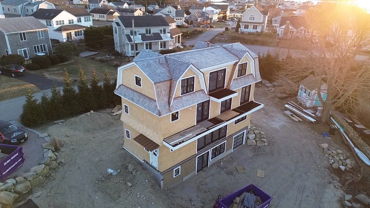 Great Island - Red Cedar Roofing, Yellow Cedar Siding, Standing Seam Copper, & Copper Gutters by Rinaldi Brothers