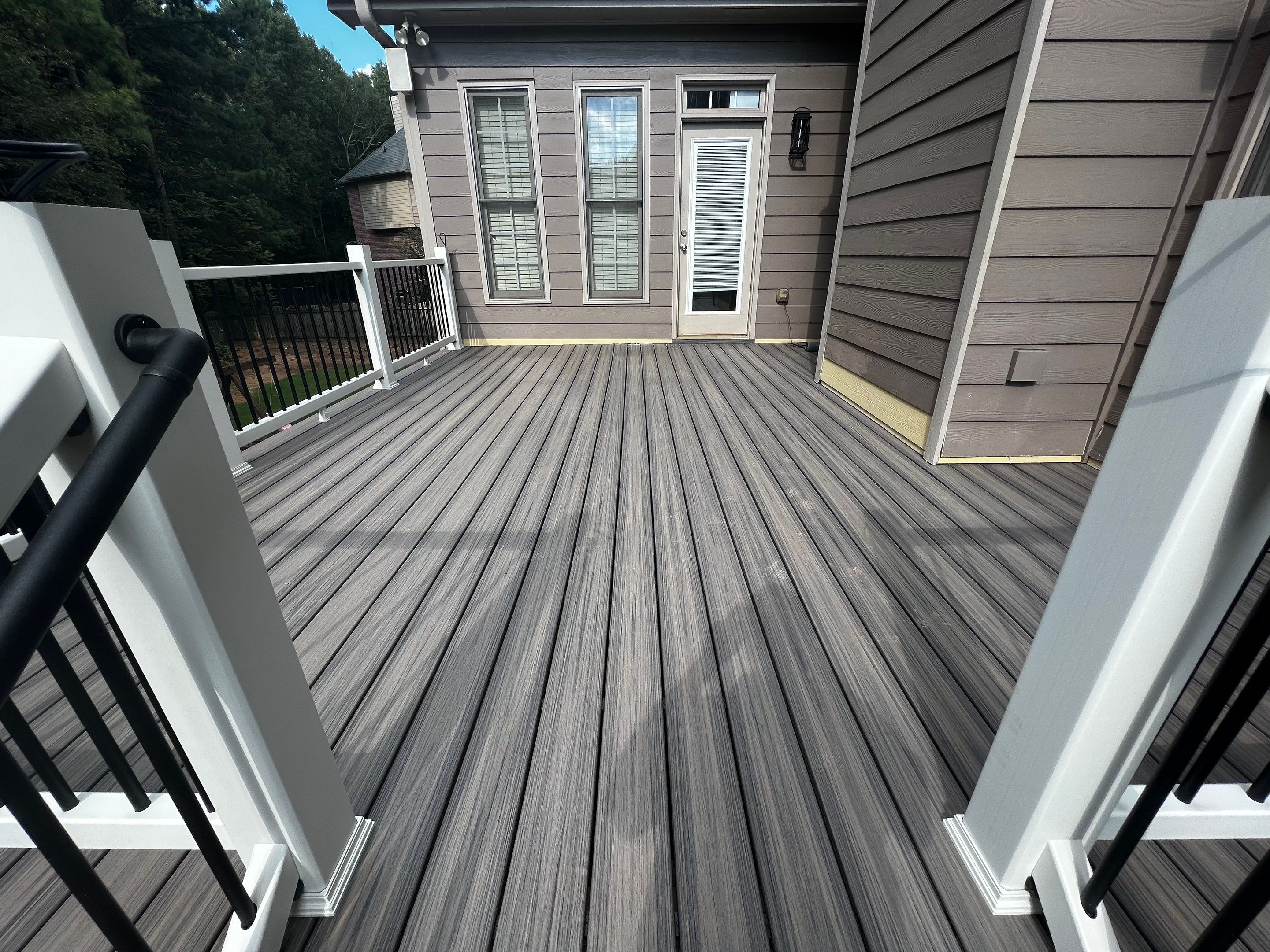 Composite Deck Installation and Screened Porch Enclosure in Roswell by Swift Home Renovations