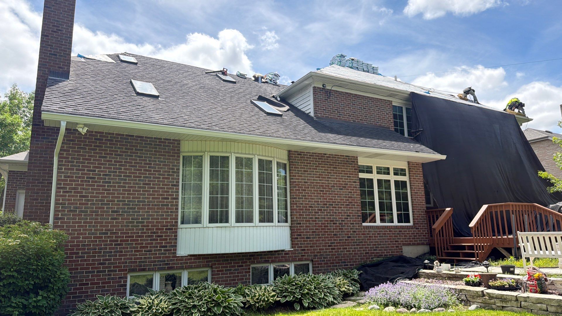 Asphalt Shingle Roof Replacement and Skylight Installation in Darien by Pro Home Services Inc