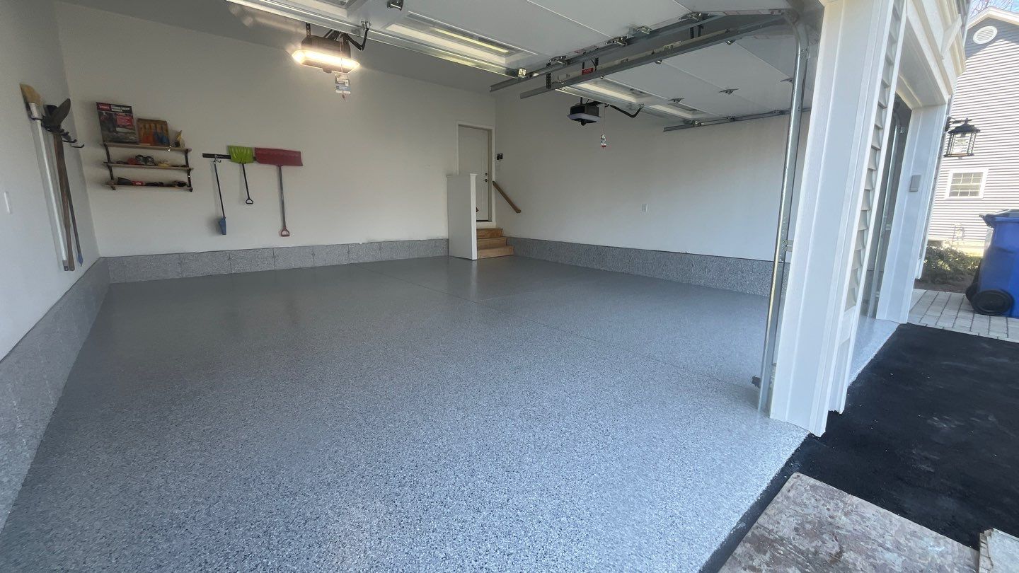 Garage in Londonderry, NH 03053 by Symphony Concrete Coatings
