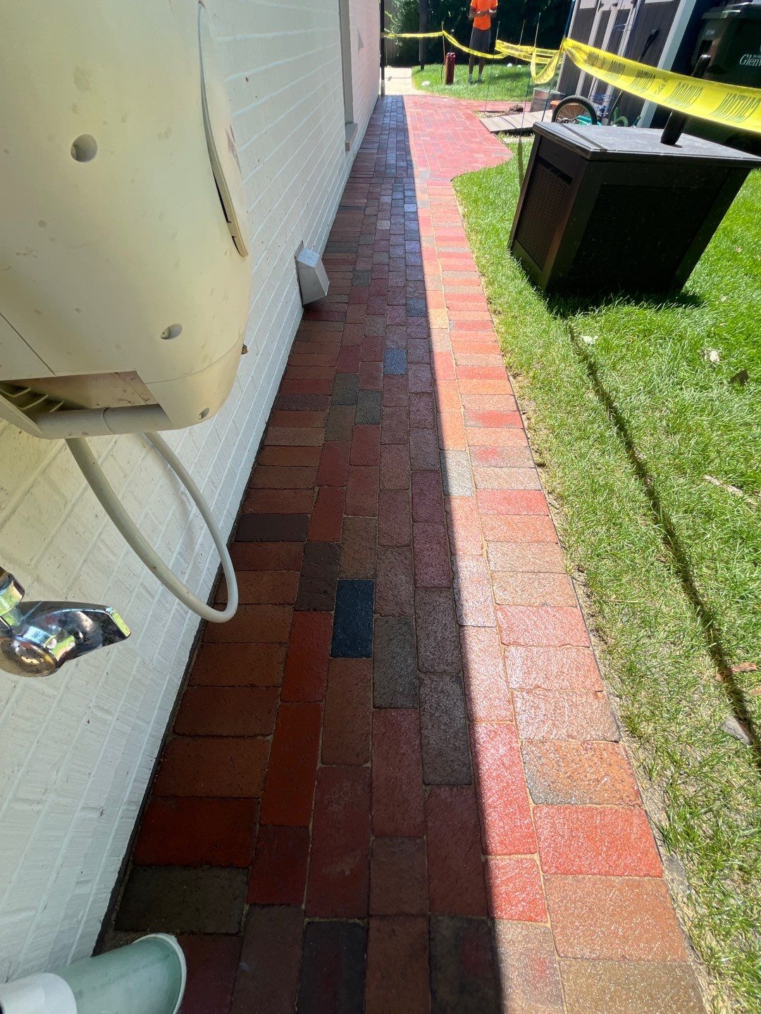 Brick paver repair, cleaning and sealing by Northern Power Washing LLC.