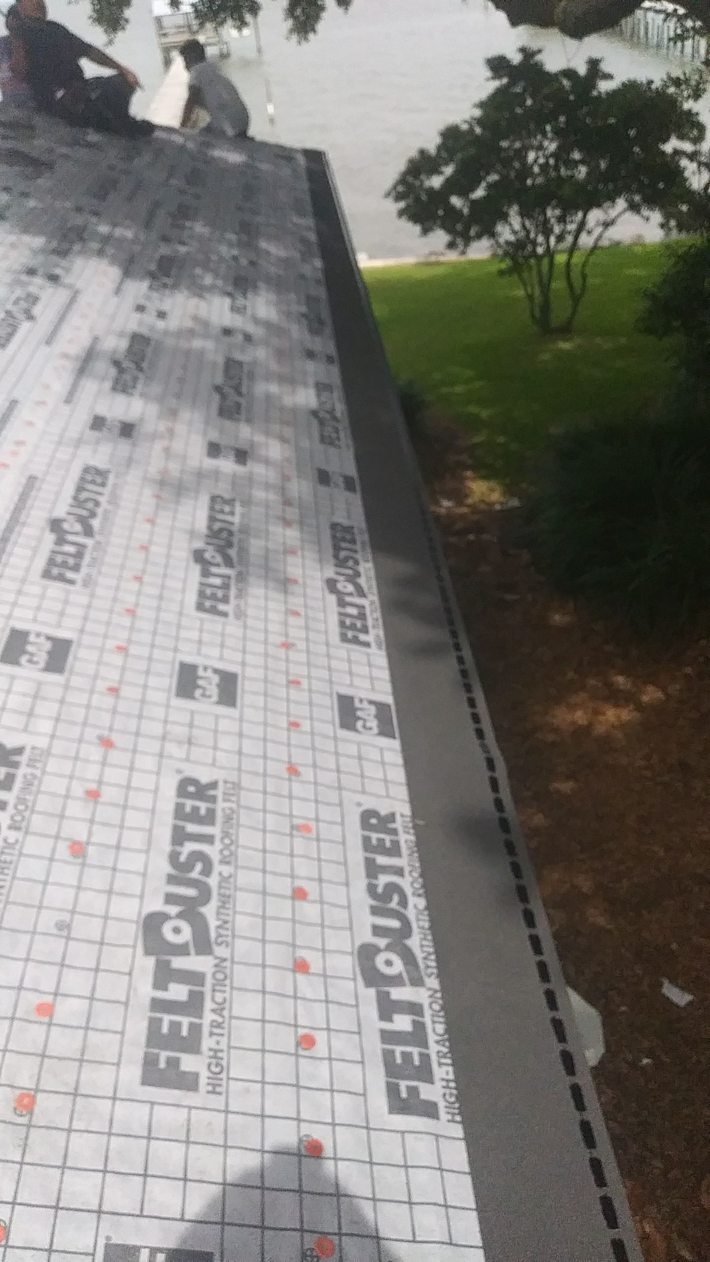 Residential Roofing Installation using Roof Replacement by American Roofing & Construction LLC