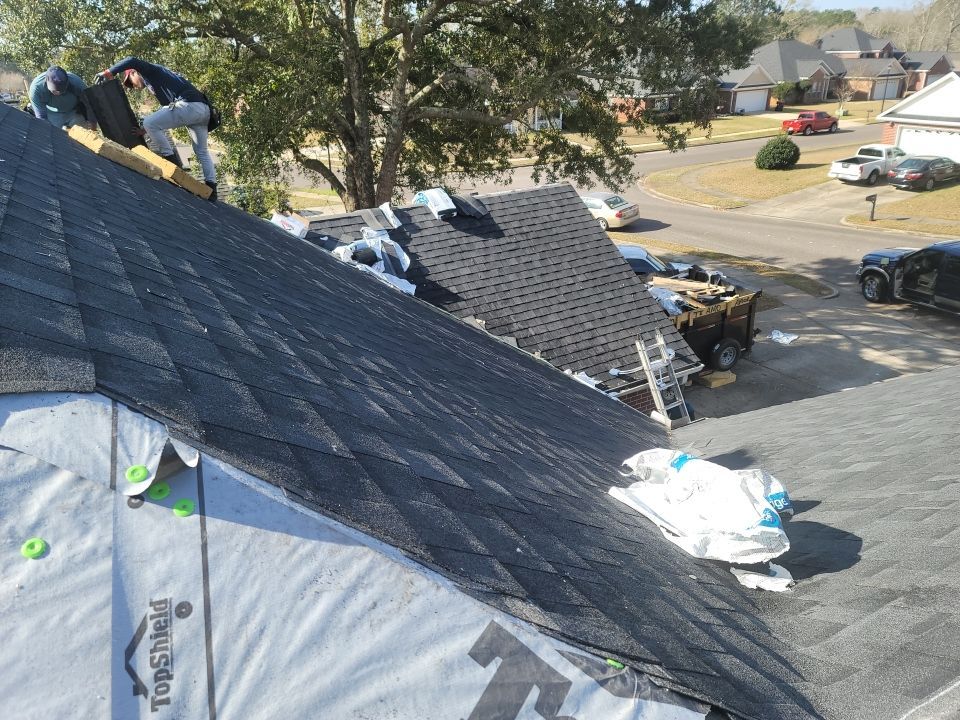 Residential Roofing Installation using Roof Replacement by American Roofing & Construction LLC