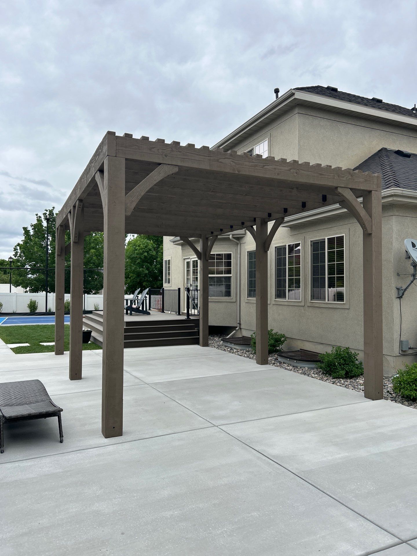 Poolside Concrete Patio Pergola by SAGE Decks