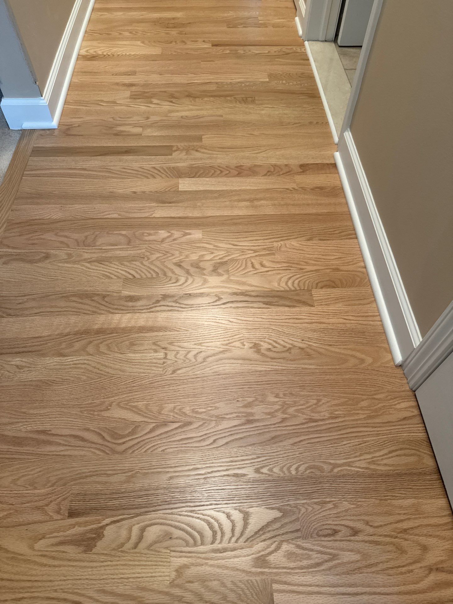 New Red Oak Natural bedroom and hall  by Ann Arbor Hardwoods 