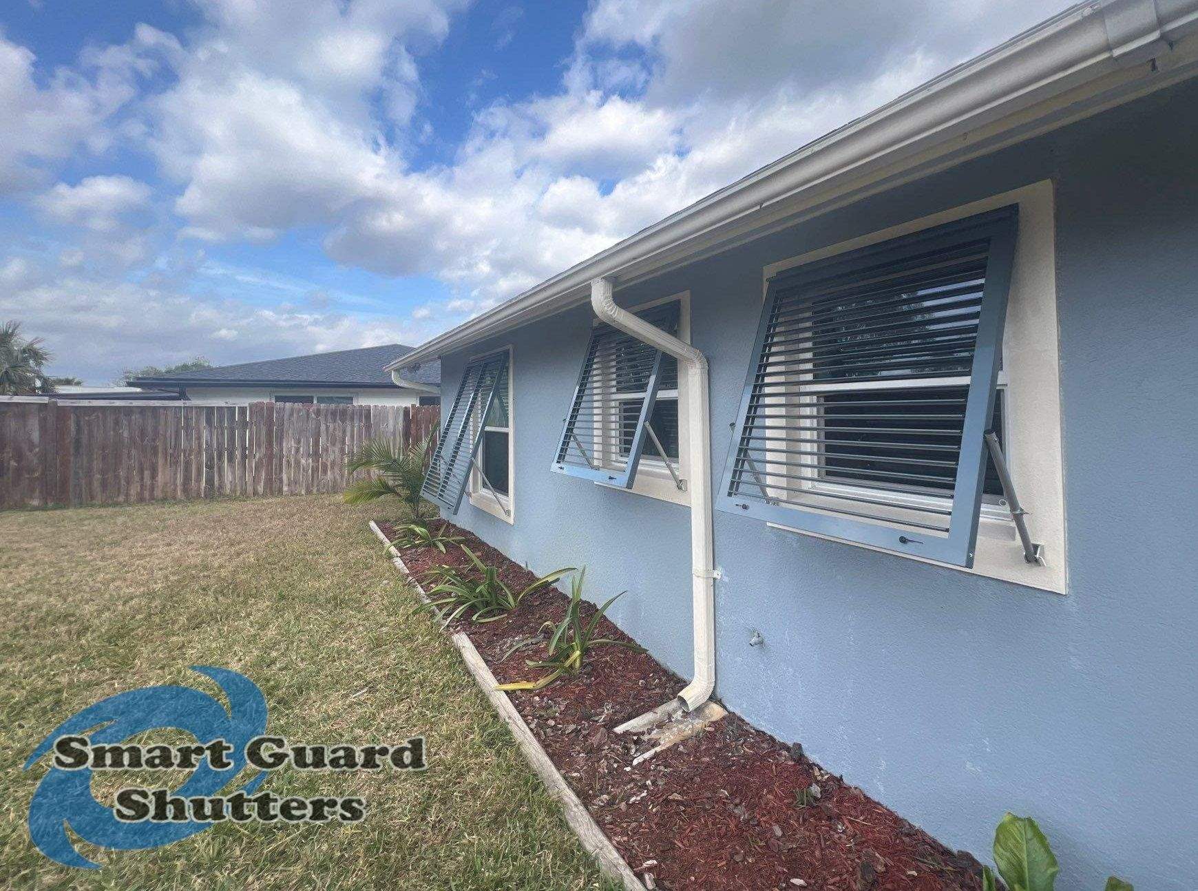 Hurricane Protection in Blue Grey by Smart Guard Shutters