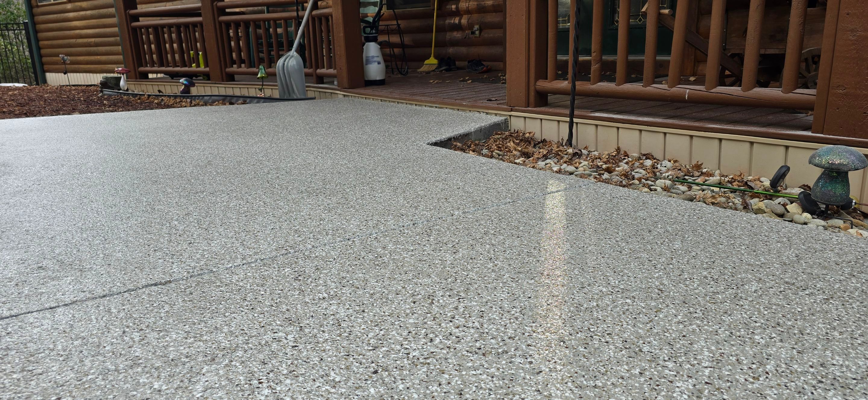 Garage & Sidewalk using Creekbed by Elite Floor Solutions