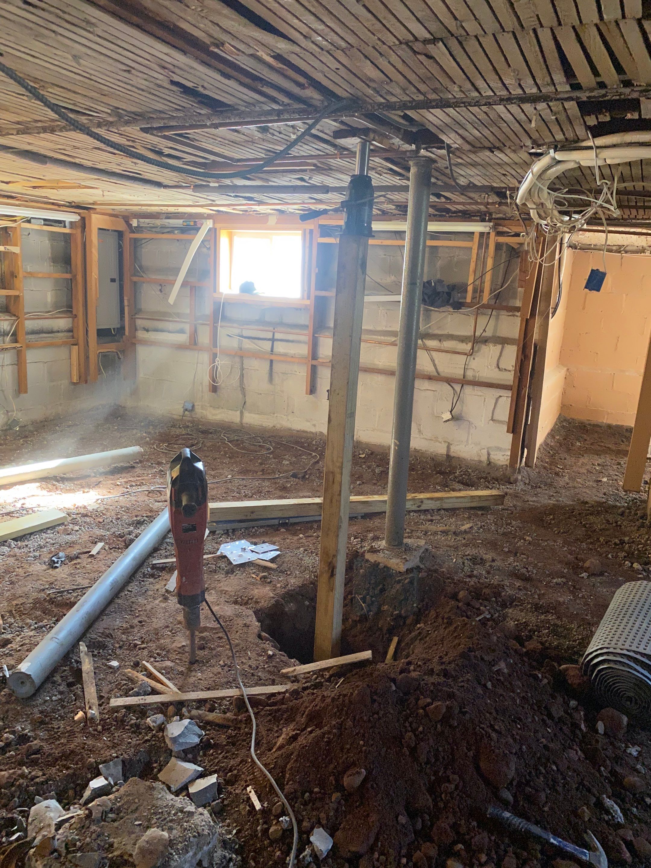 Interior French Drain, Lally Column Replacement & Concrete Floor Replacement in South Orange, NJ by Pure Service Pro, LLC