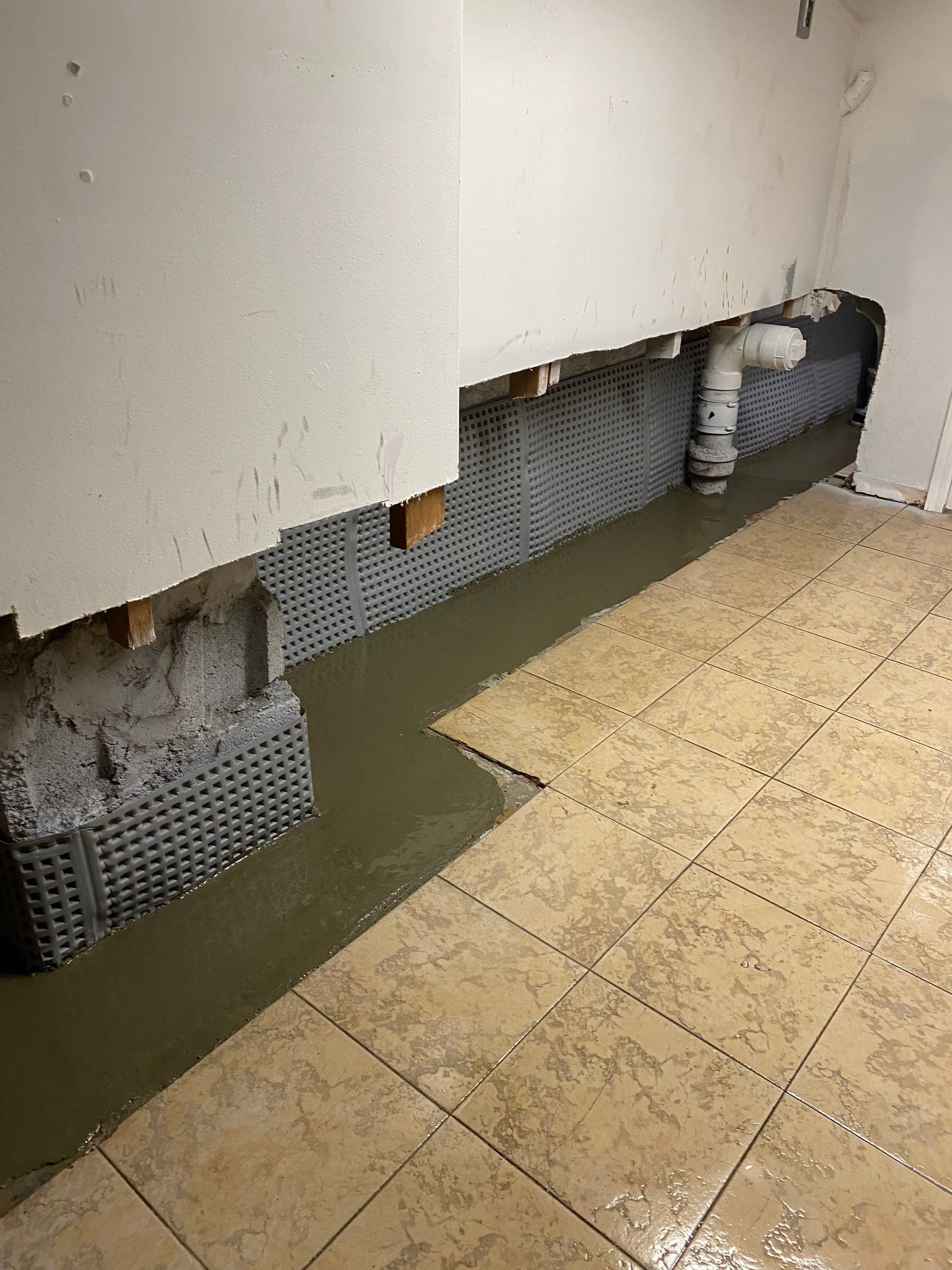 Interior French Drain Job in Bayonne, NJ by Pure Service Pro, LLC 