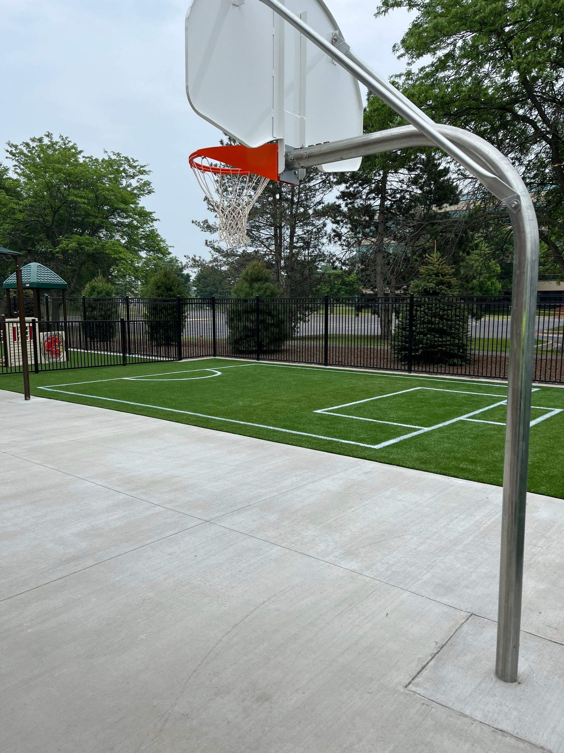 KinderCare of Lincolnshire Commercial Playground Turf Installation by Southwest Greens Midwest