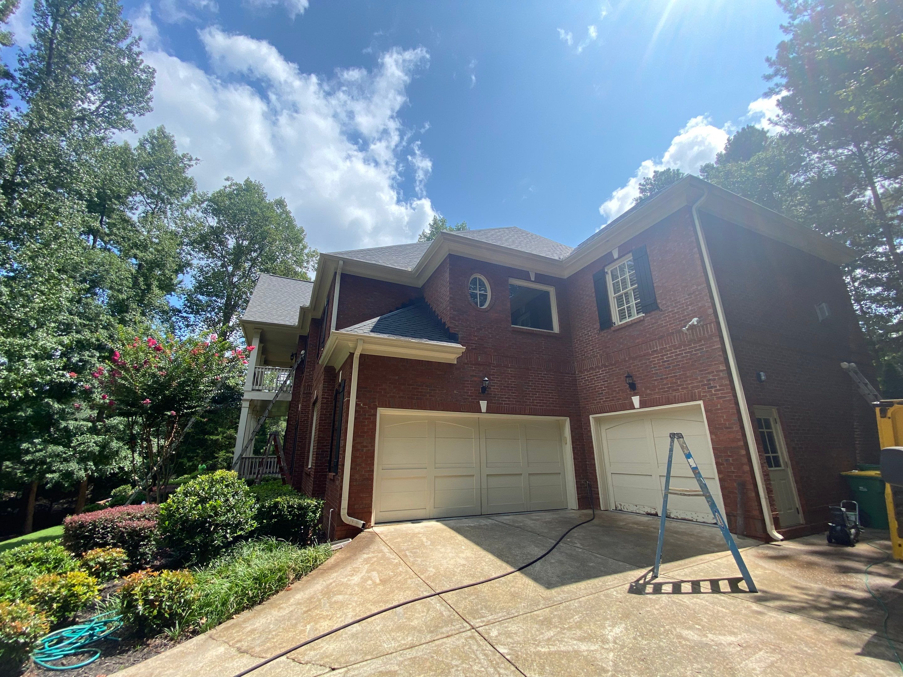 Exterior Trim and Garage Door Painting for Alpharetta Brick Home by Swift Home Renovations