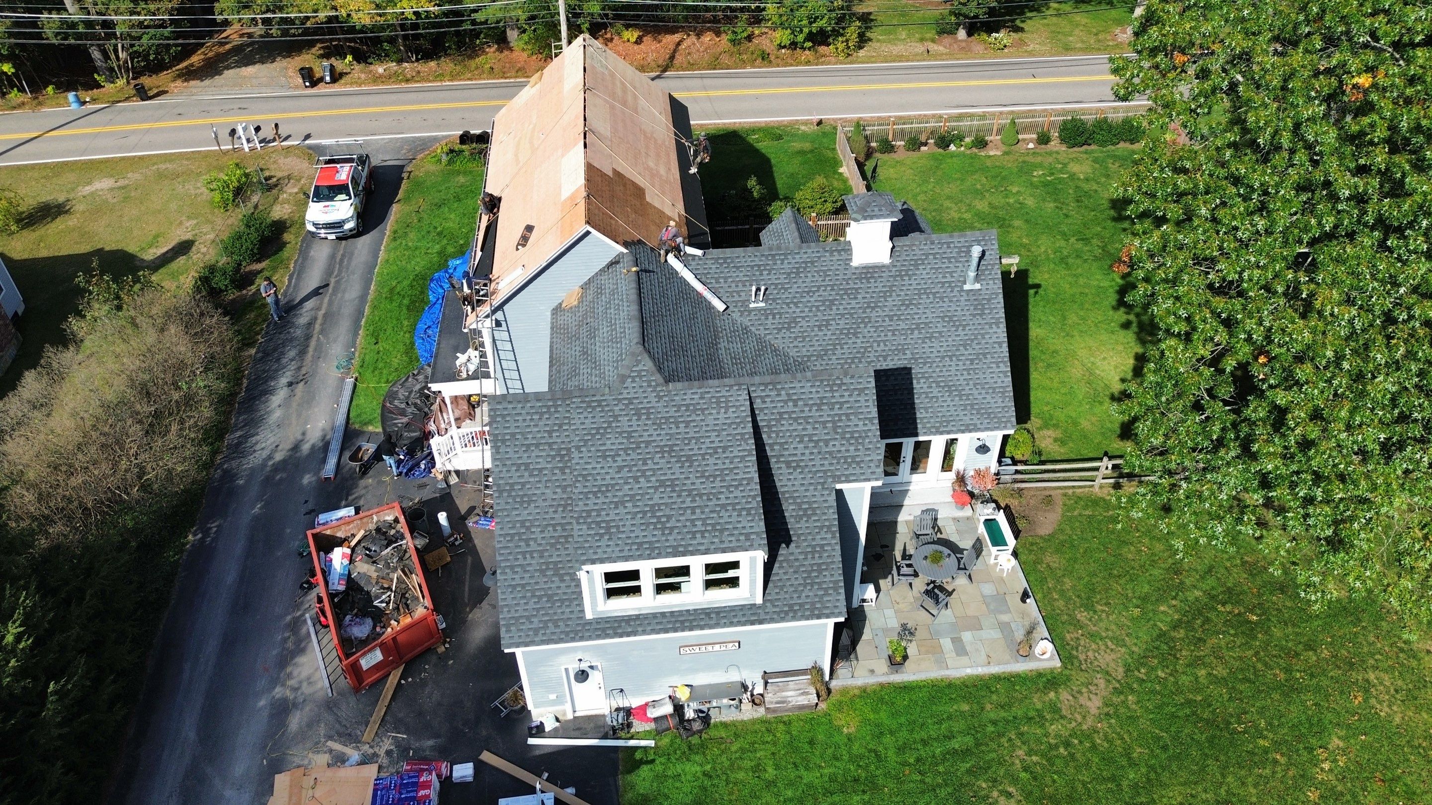 Roof Replacement & Chimney Removal – Westford, MA by Mighty Dog Roofing of Greater Middlesex County