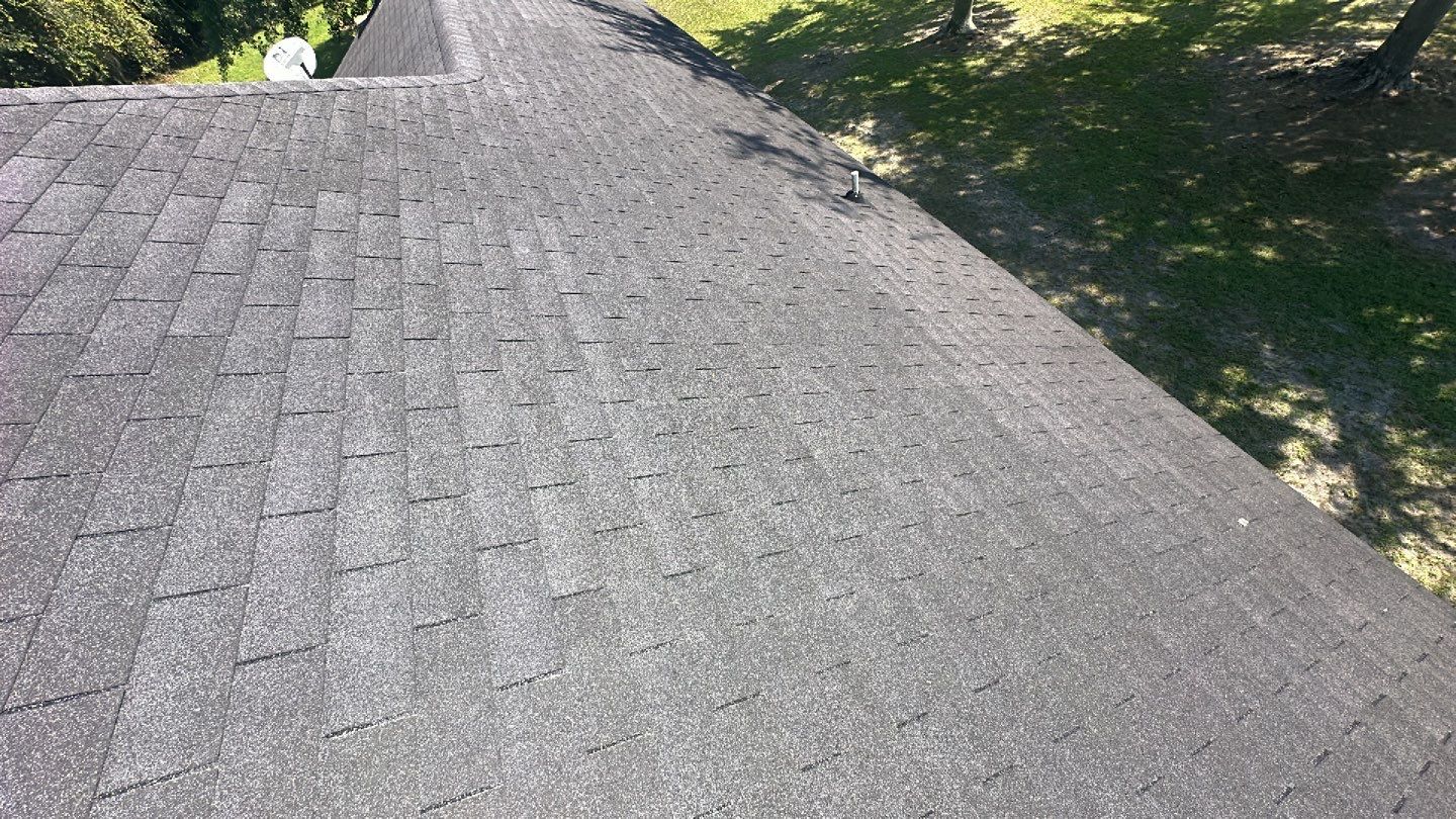 Residential Roofing Installation using Benton 26Ga 1inc Snapcock Metal Roof KYNAR Matte Black by Talya Roofing