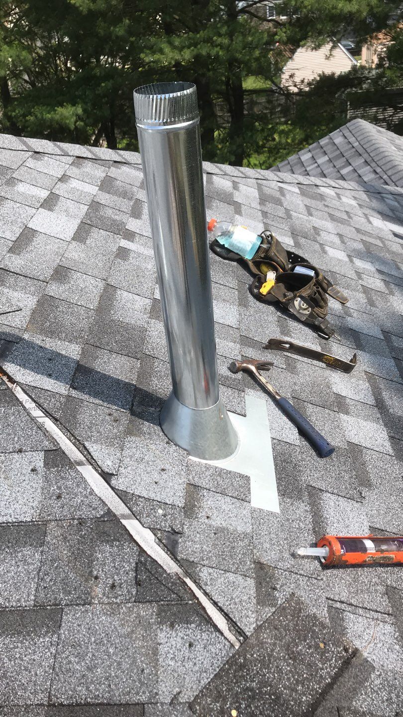 Commercial Roofing Installation using EPDM with white gutters by A Plus Exterior