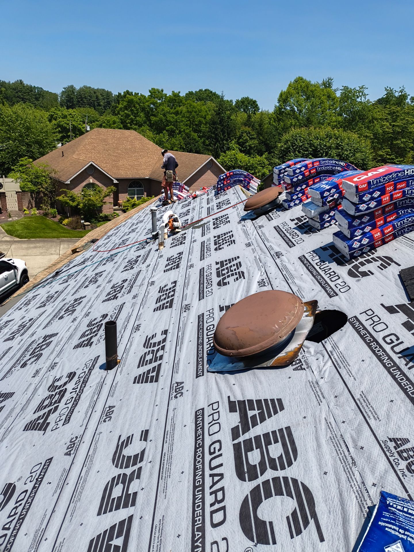 Residential Roofing Installation using GAF Timberline HDZ Shakewood by Rainstoppers Roofing